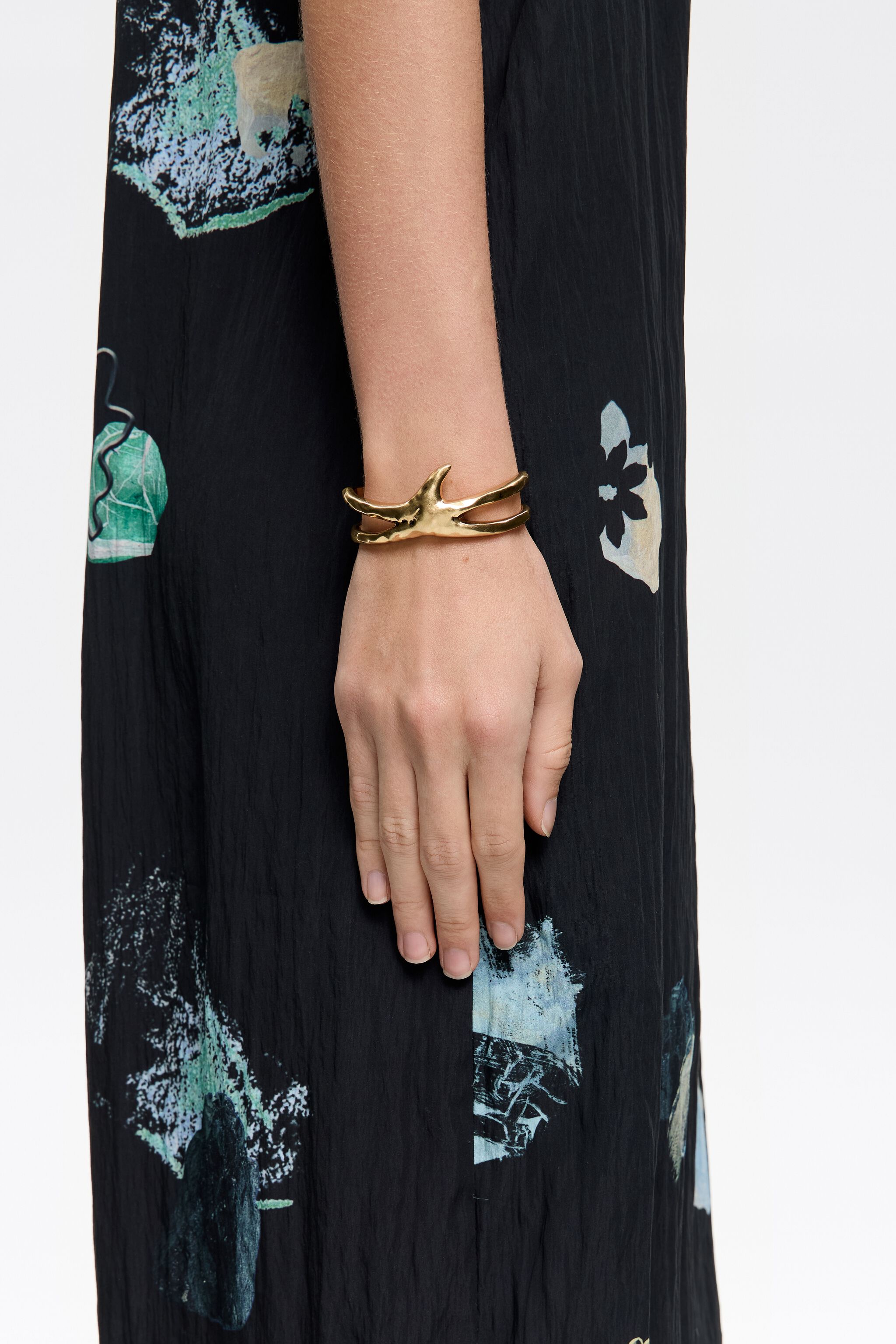 Aged finish textured gold-tone metal star bracelet