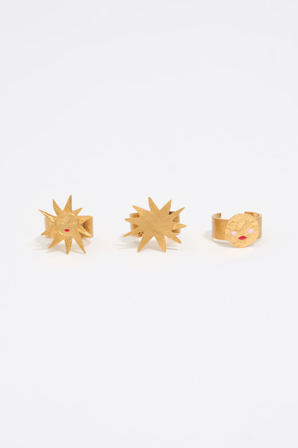 Set of three gold sun and moon rings