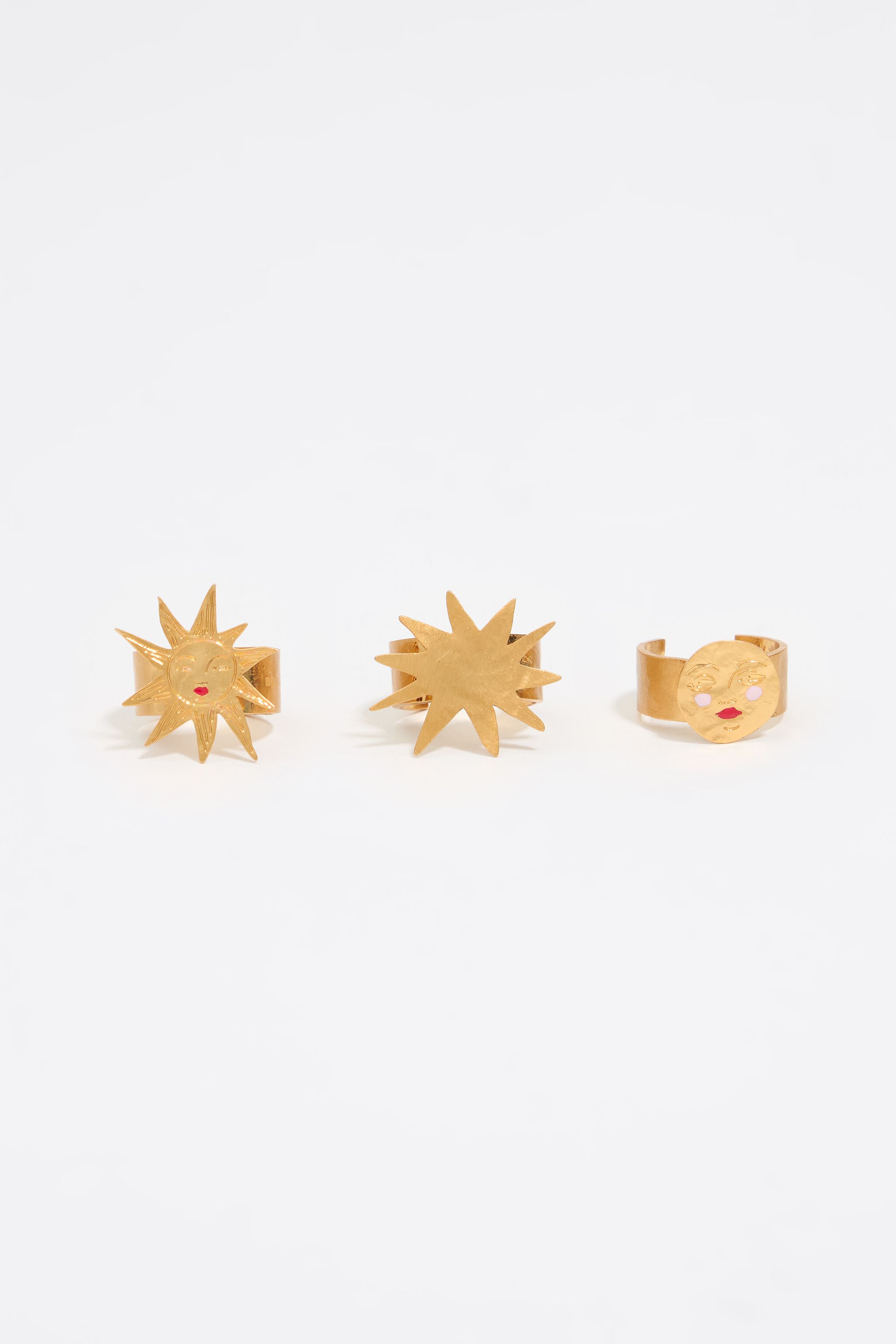 Set of three gold sun and moon rings