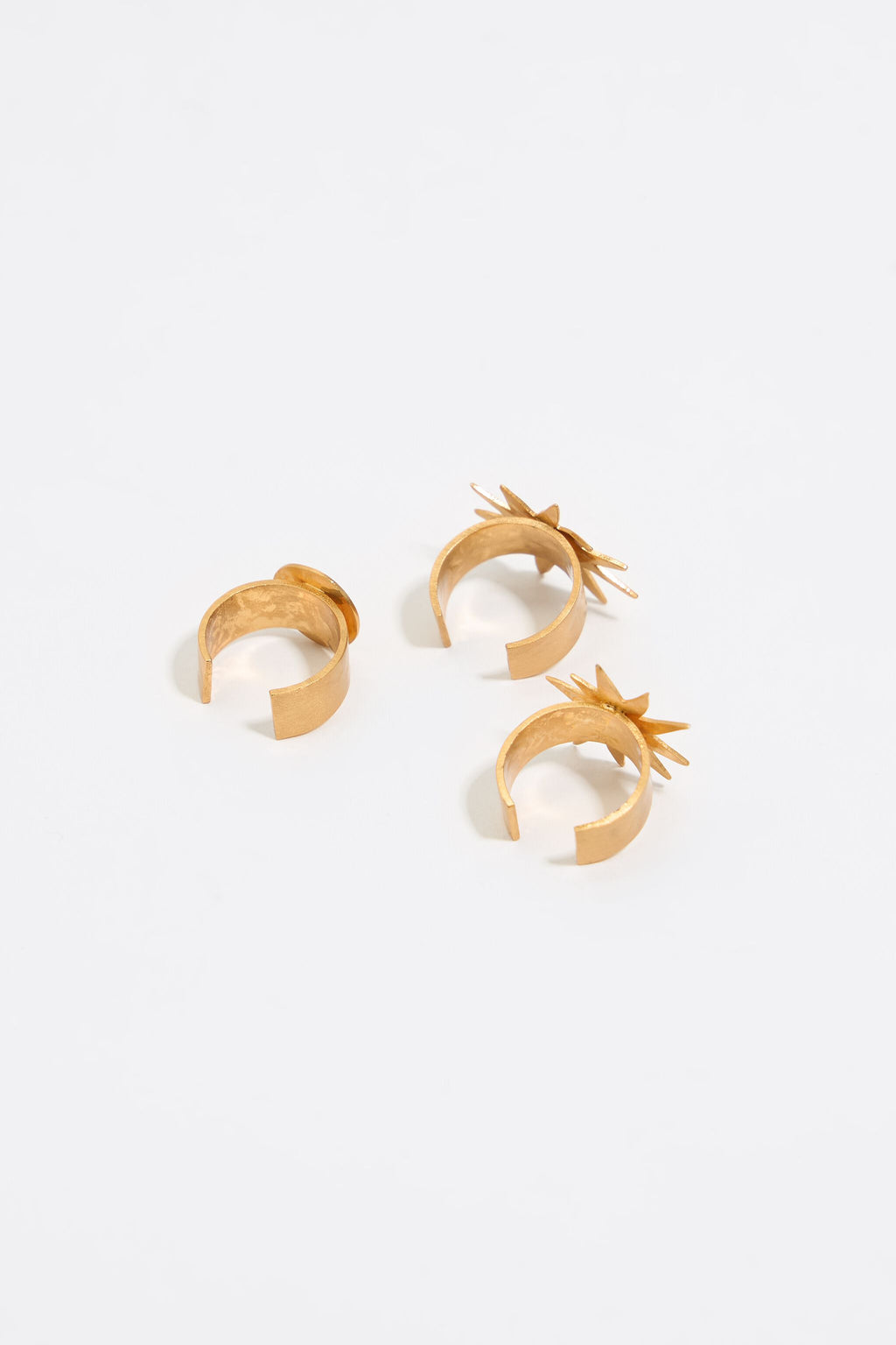 Set of three gold sun and moon rings