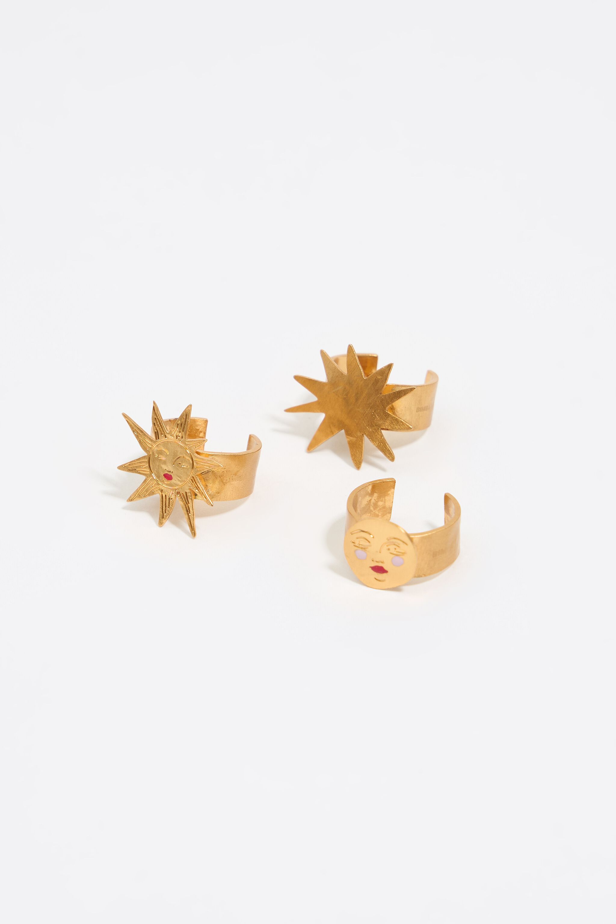 Set of three gold sun and moon rings