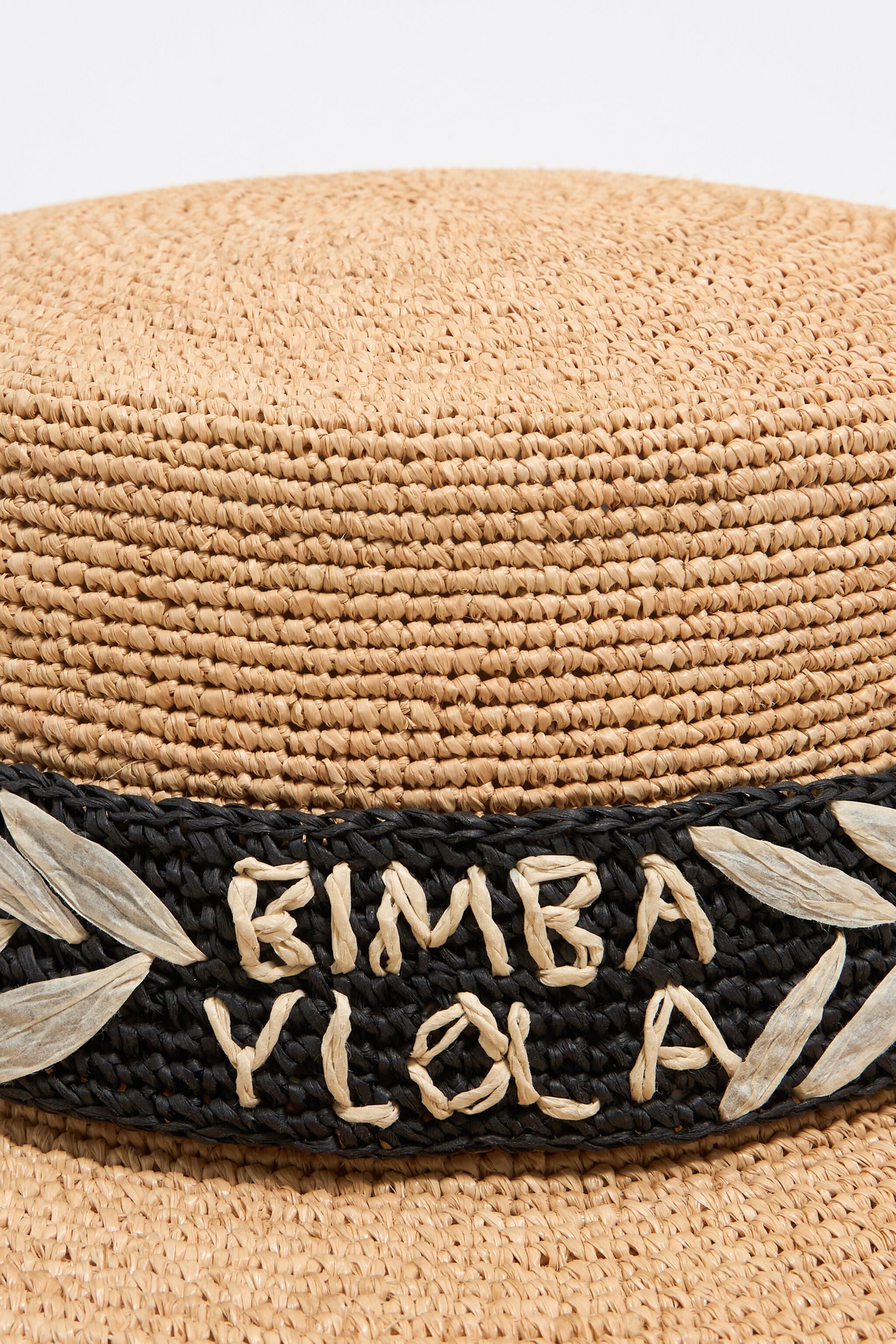 Black embroidered beige paper raffia hat