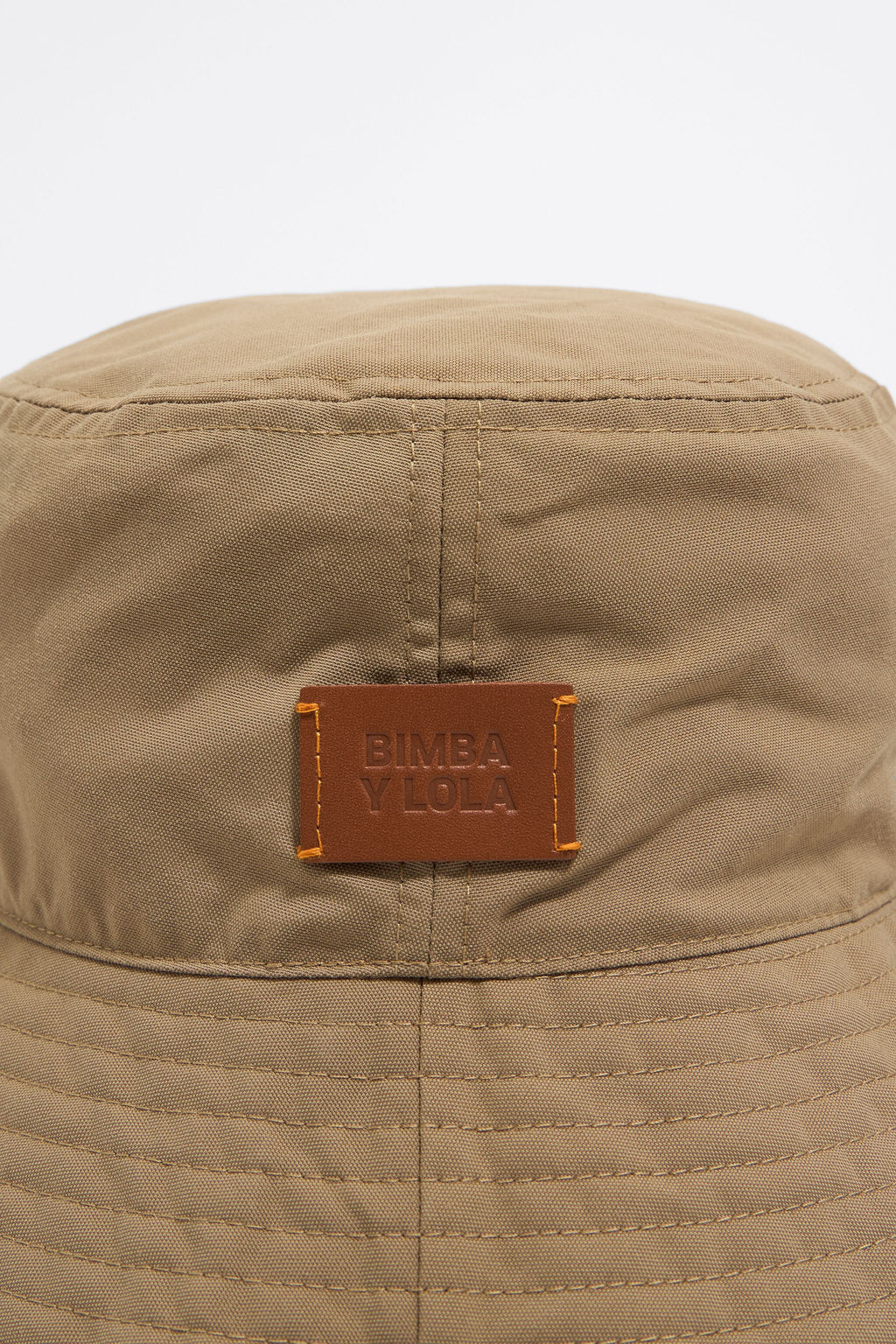 Camel trench bucket hat