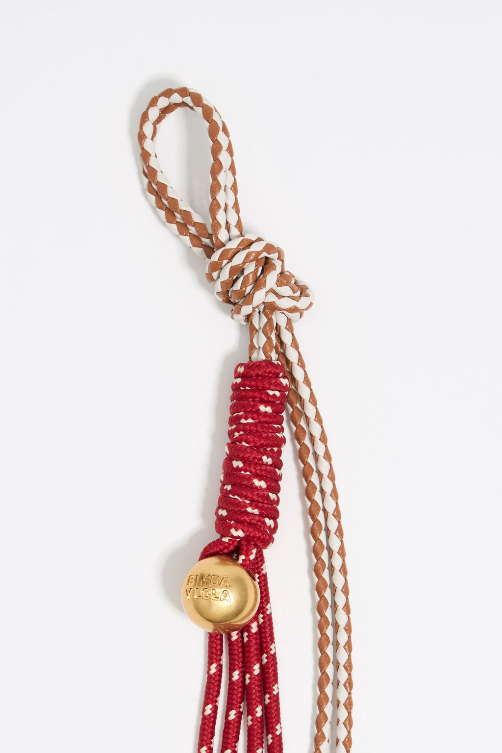 Long red rope bag charm