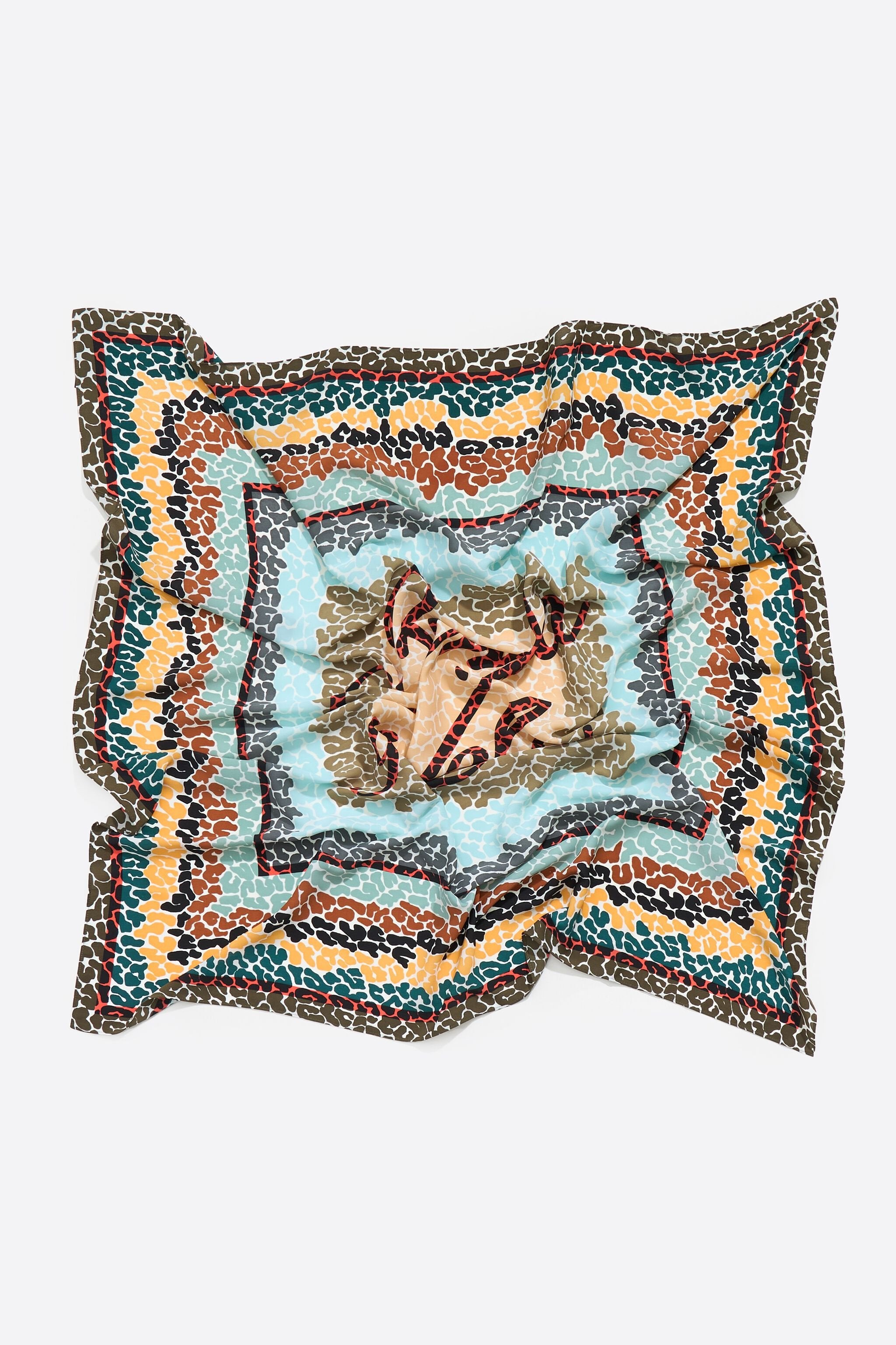 Ivory leopard borders and logo scarf