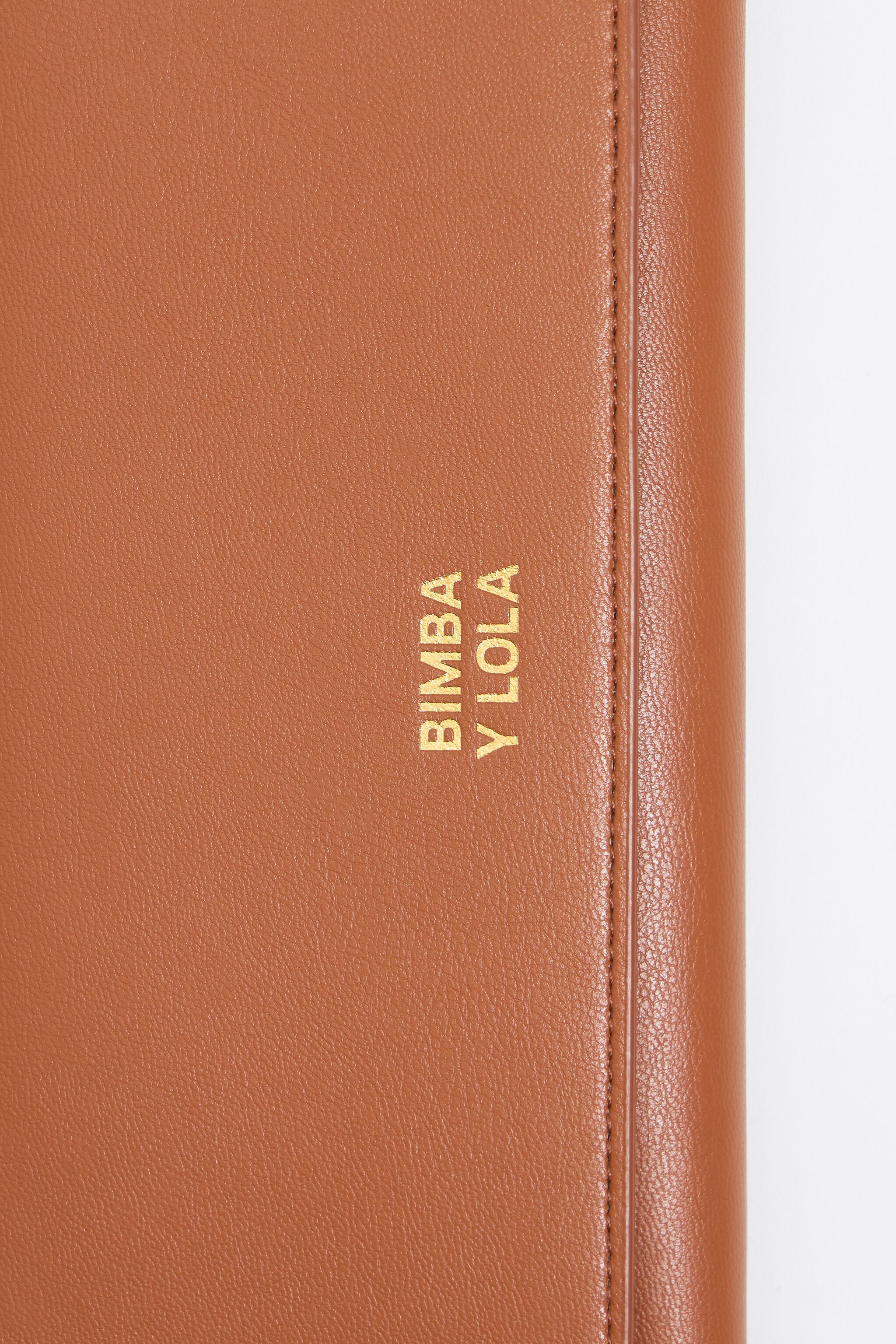 Tan leather continental wallet
