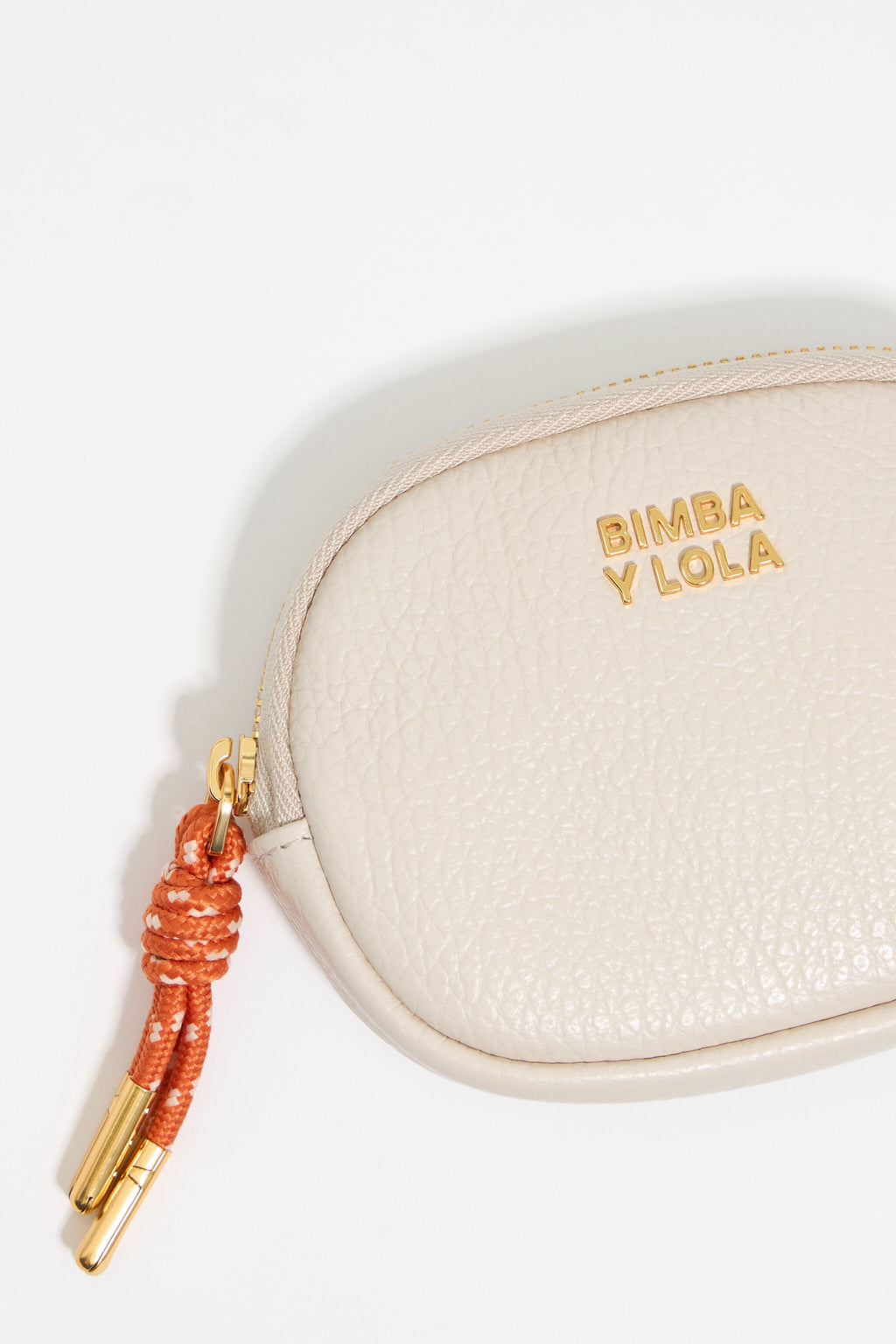 Off-white leather oval coin purse