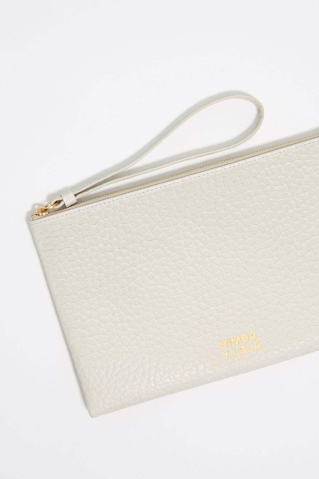 Off-white leather make-up case