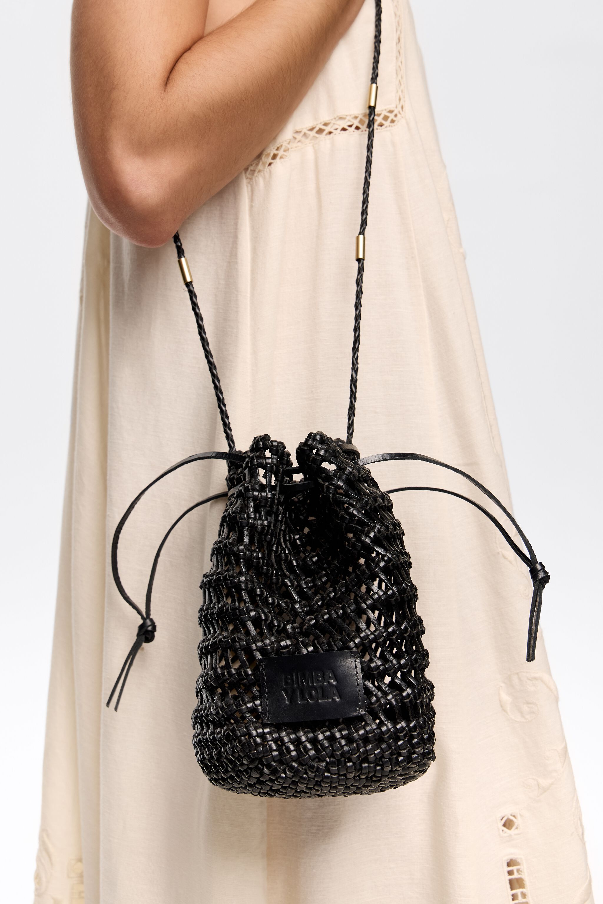 Small black plaited leather bucket bag