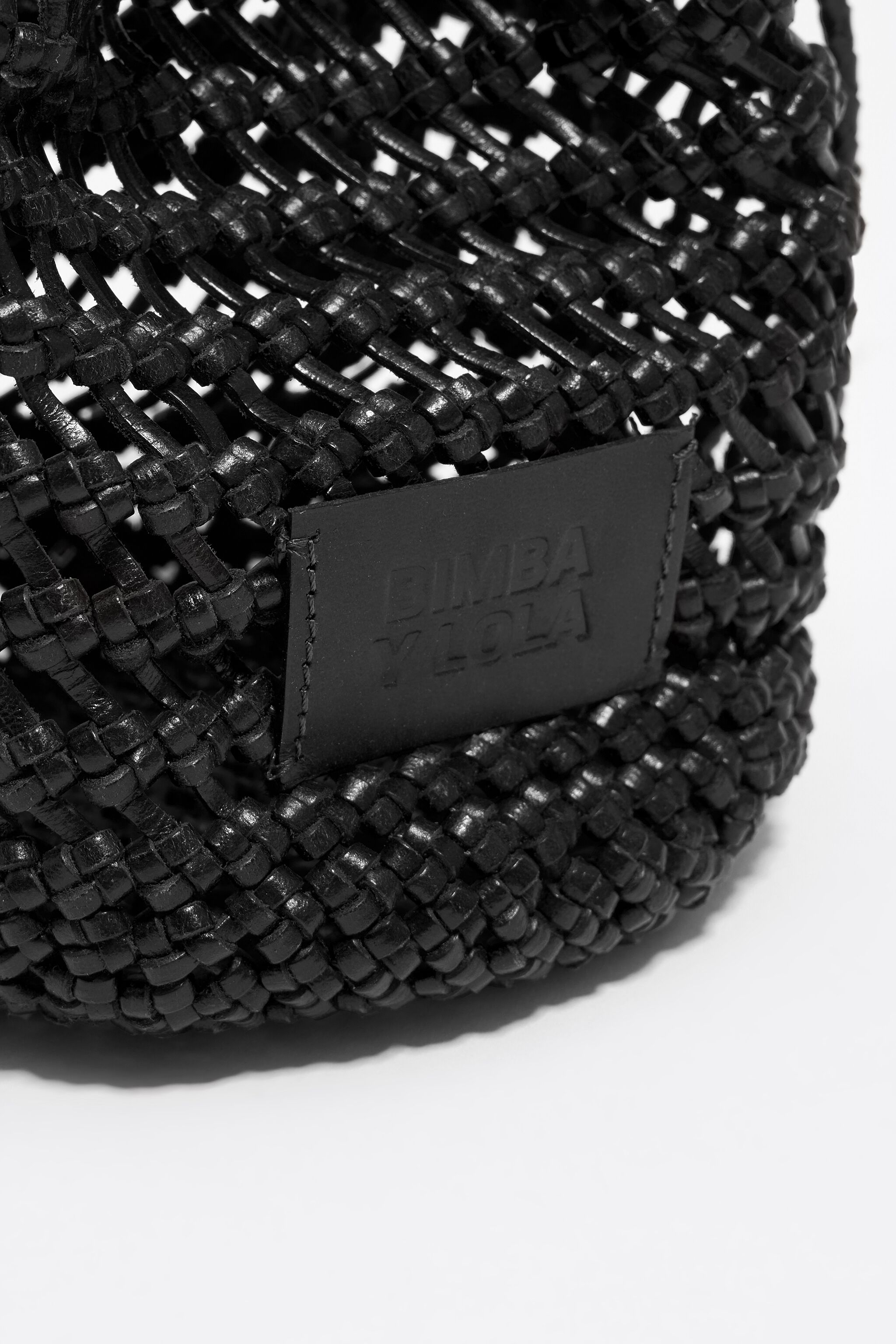 Small black plaited leather bucket bag