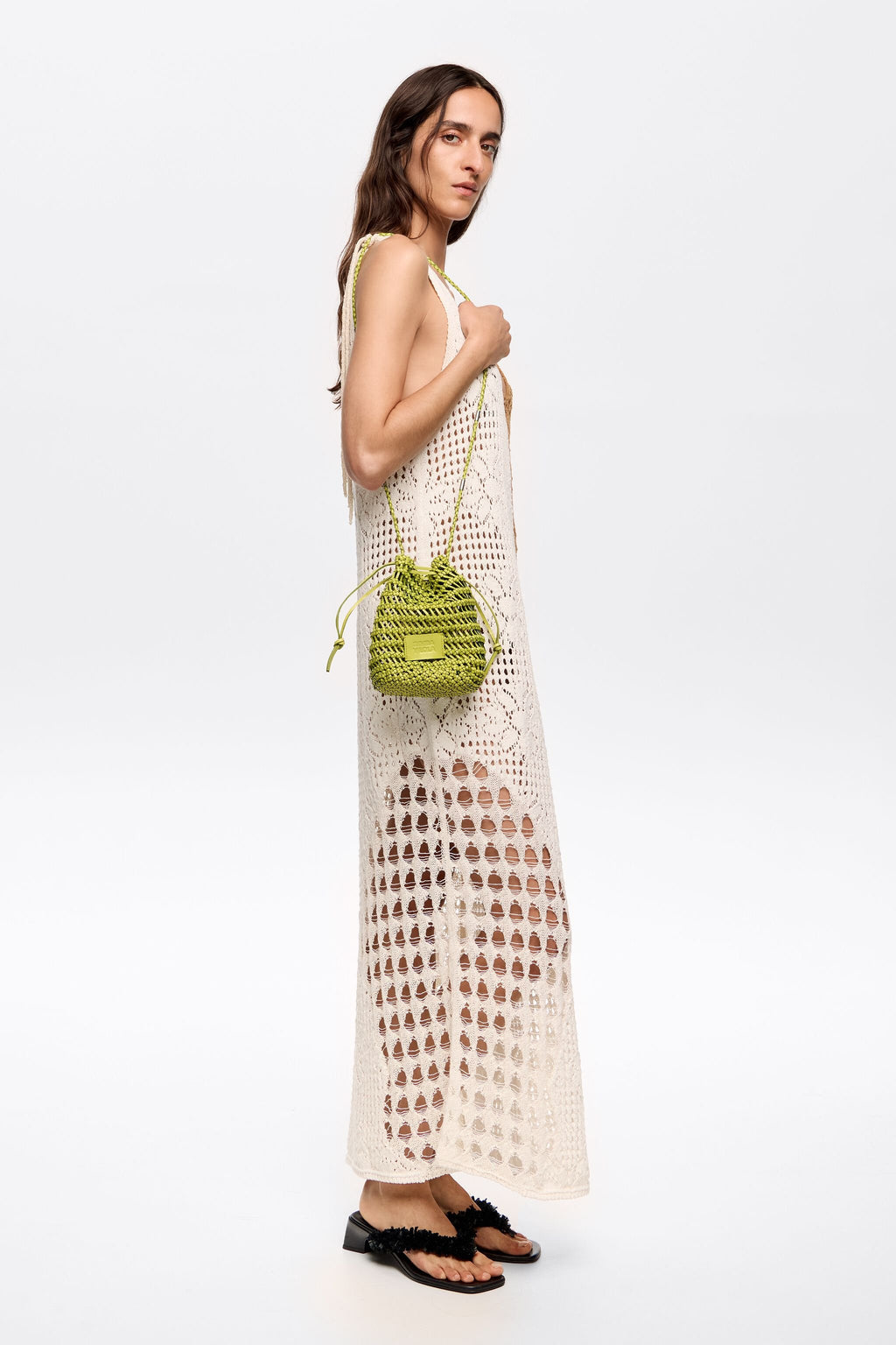 Small acid lime plaited leather bucket bag