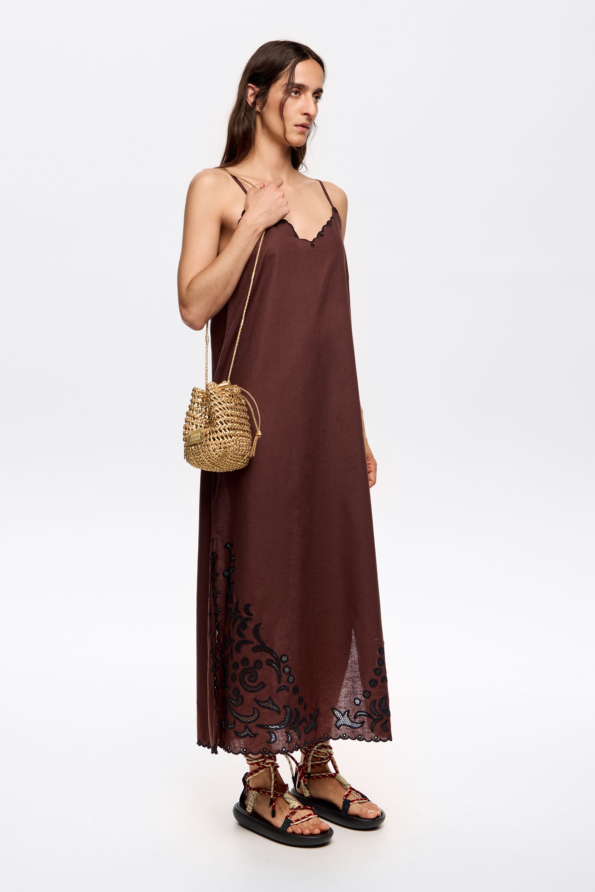 Small gold plaited leather bucket bag