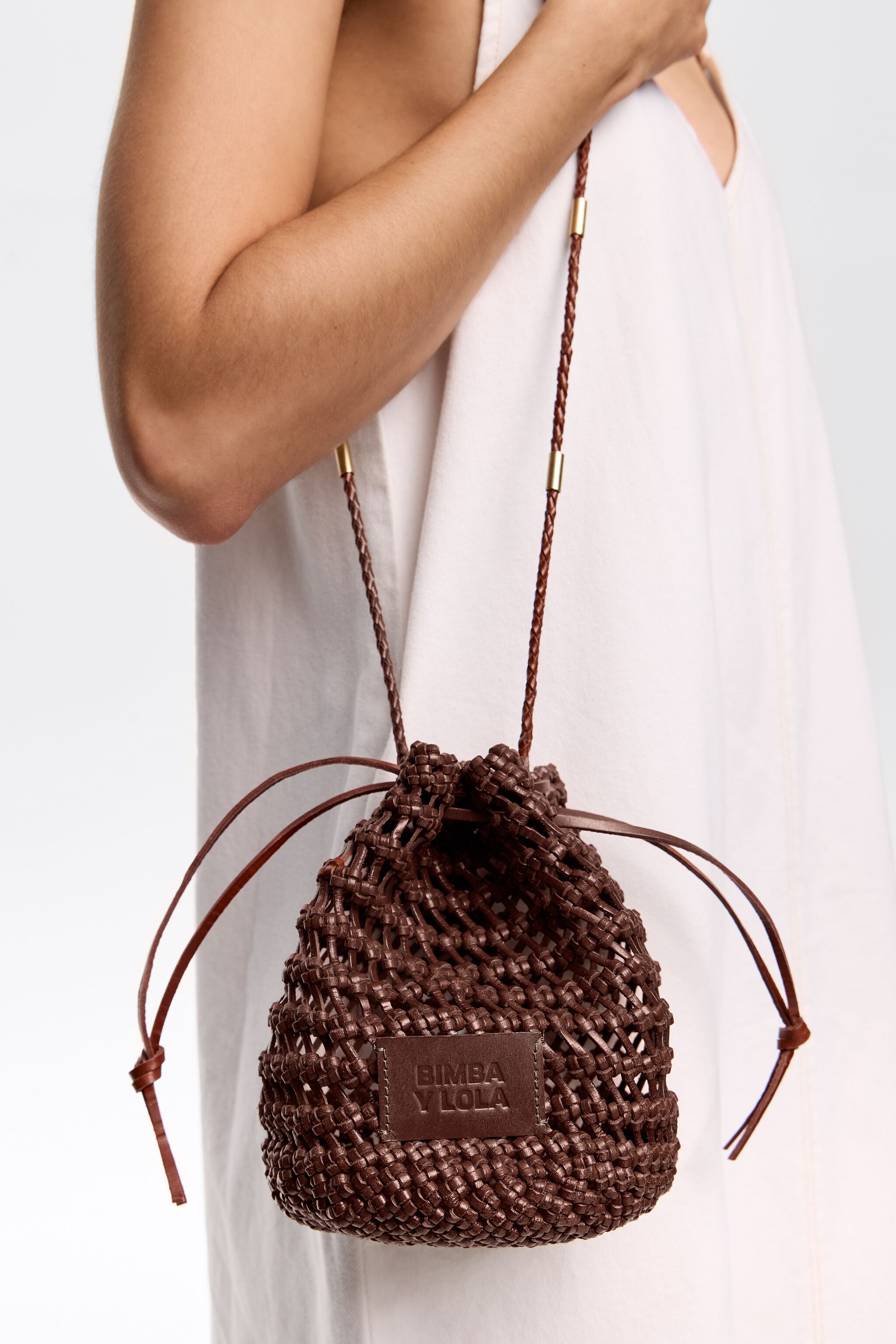 Small walnut plaited leather bucket bag