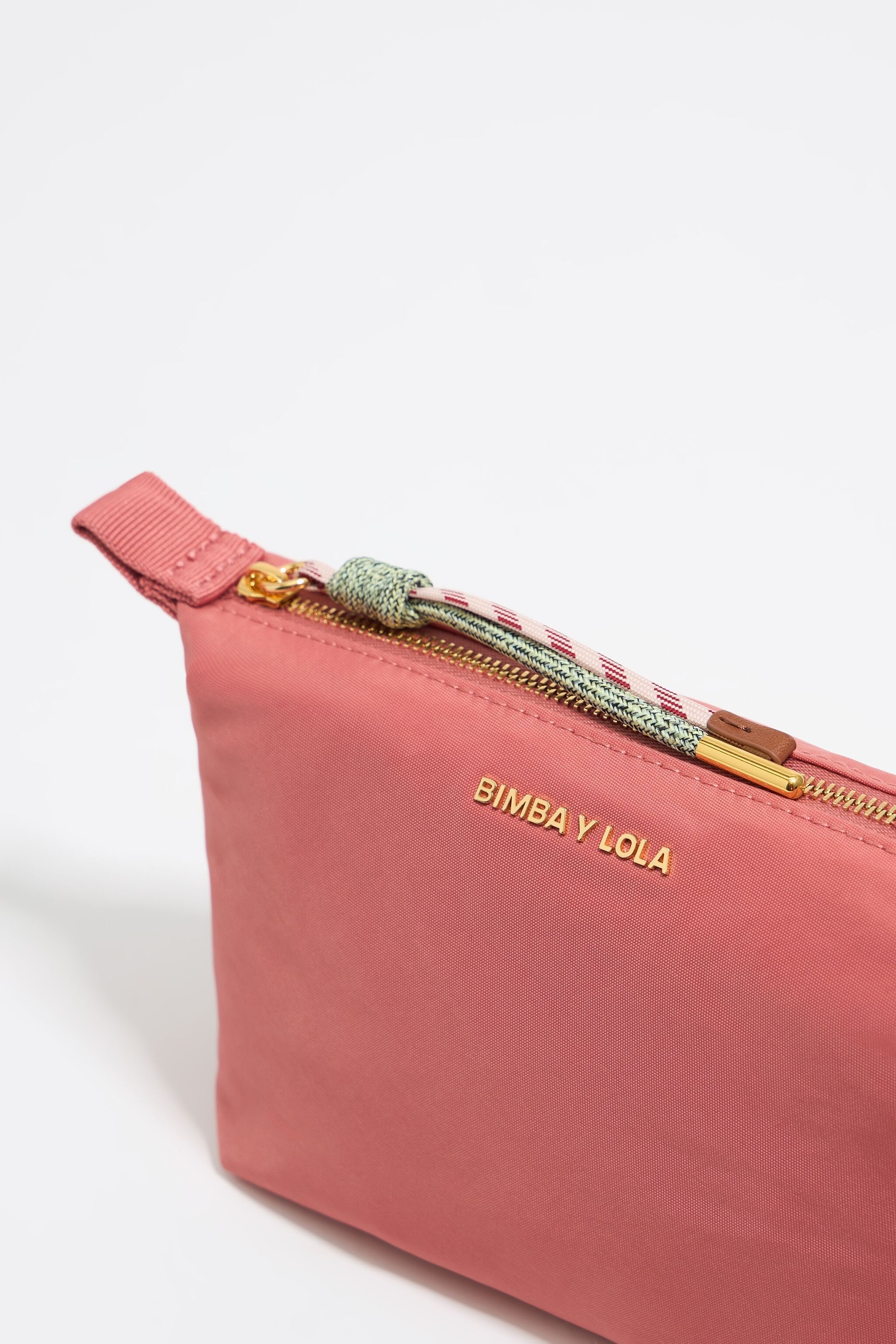 Small pink nylon trapezium make-up case