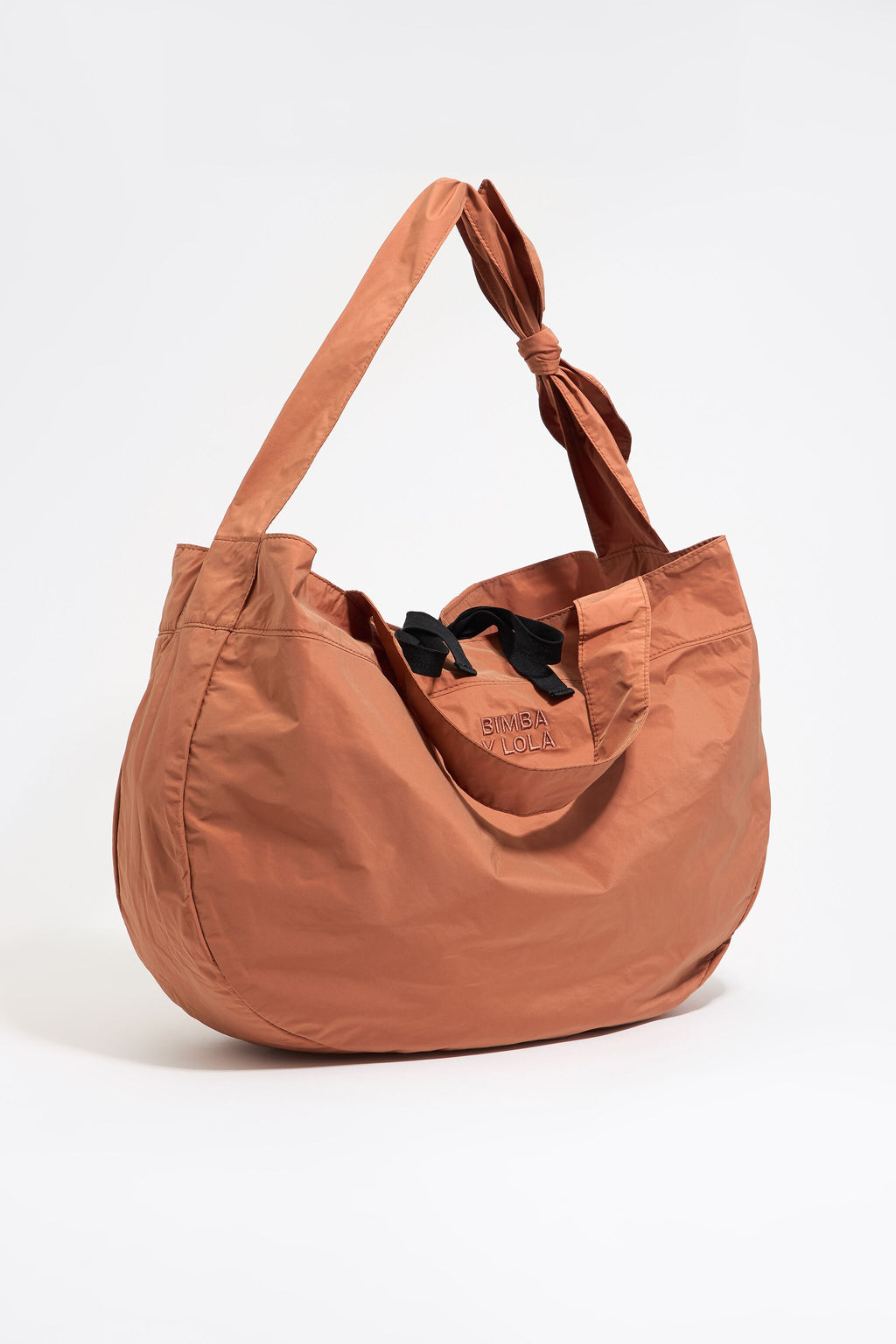 Large orange nylon shopper bag