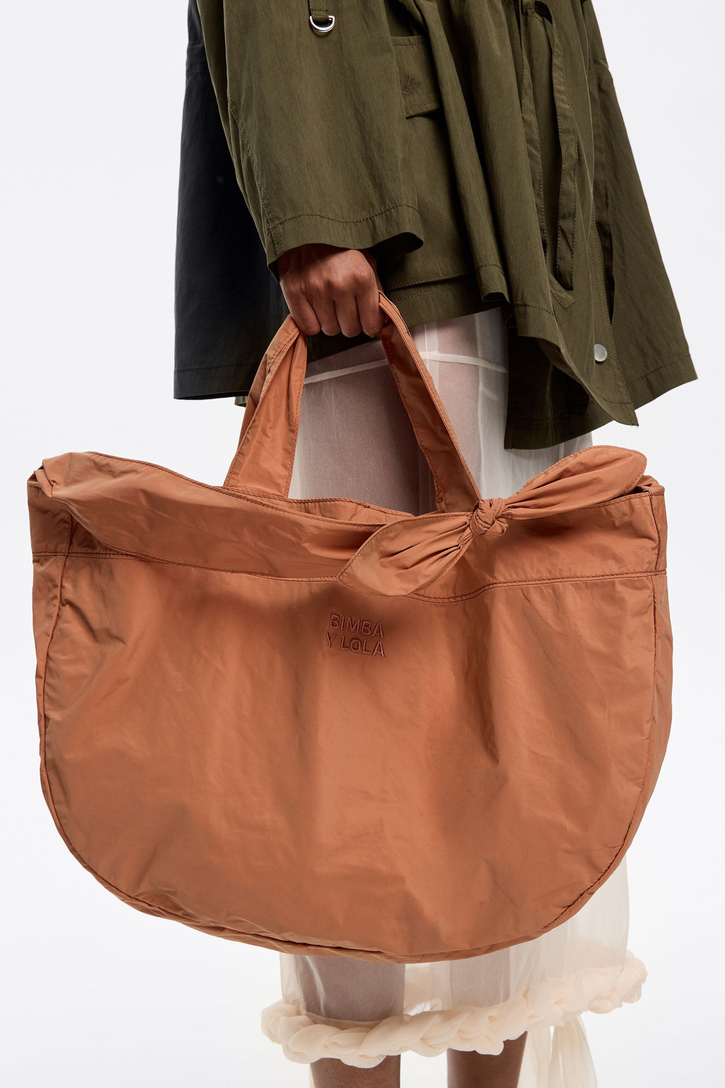 Large orange nylon shopper bag