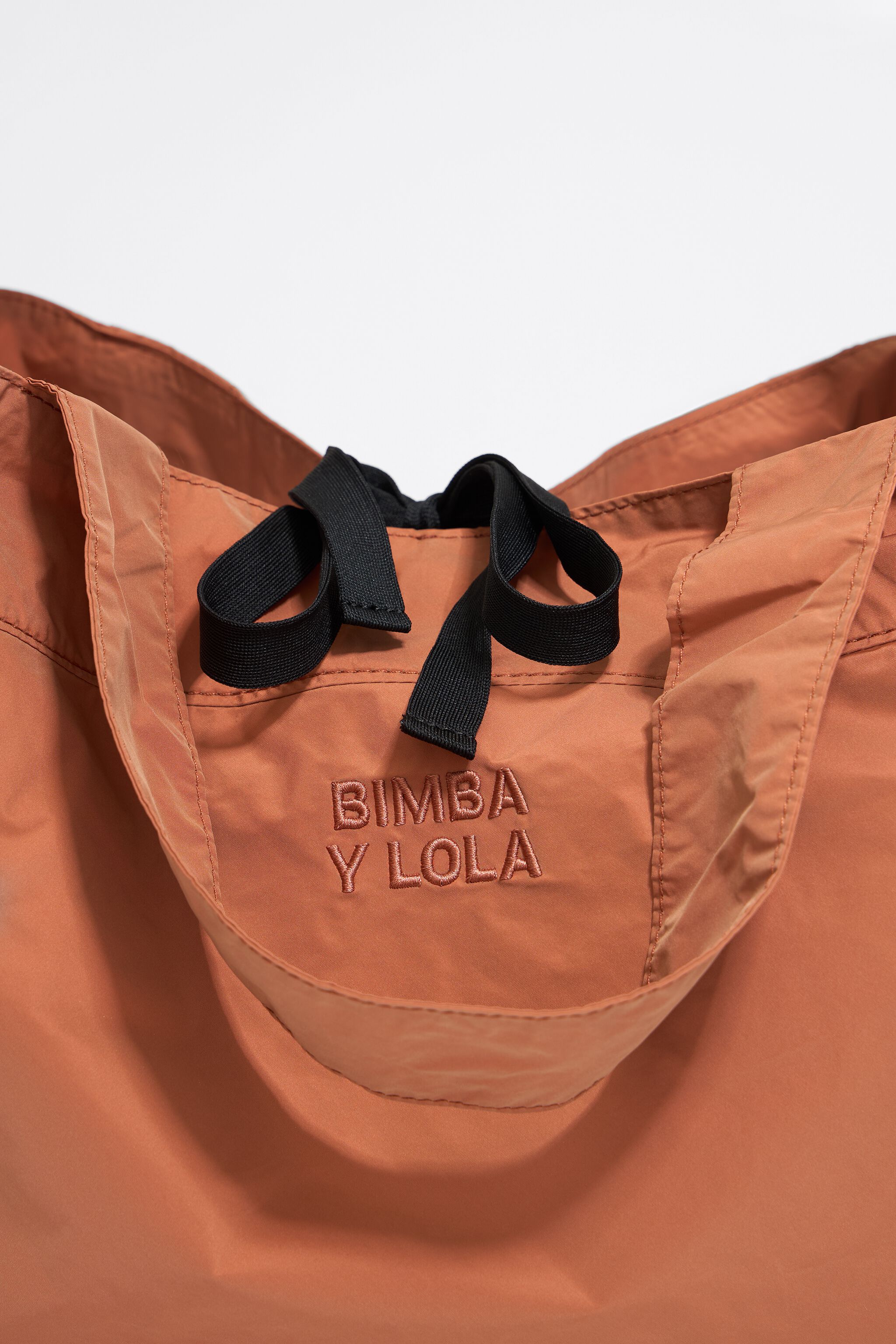 Large orange nylon shopper bag