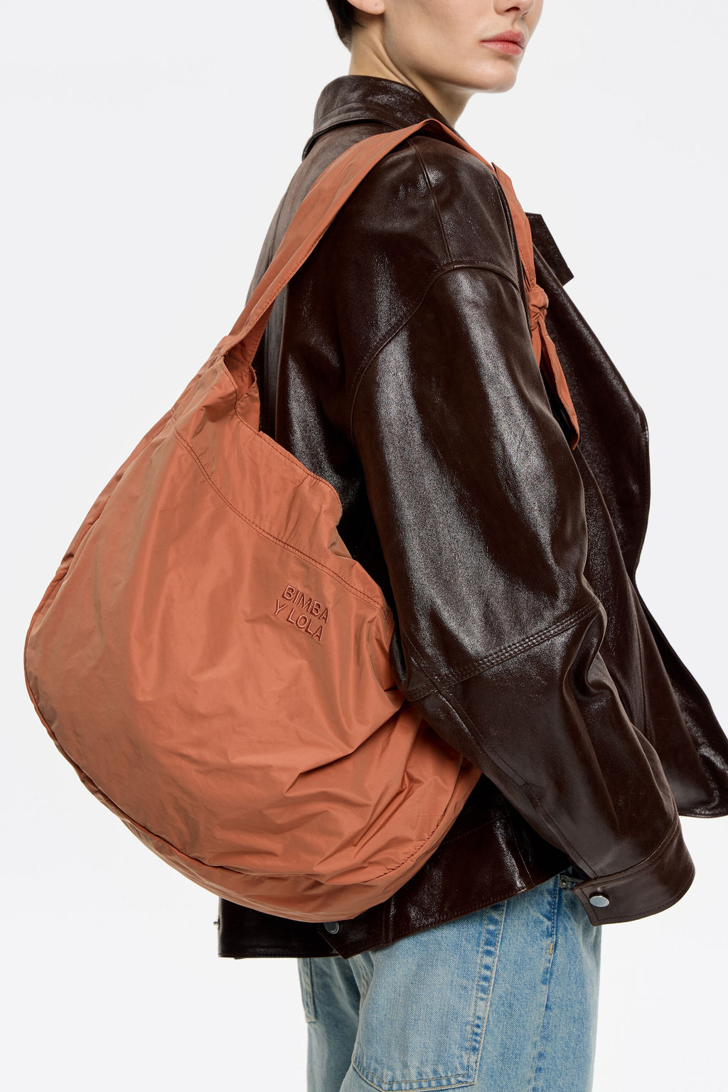 Large orange nylon shopper bag