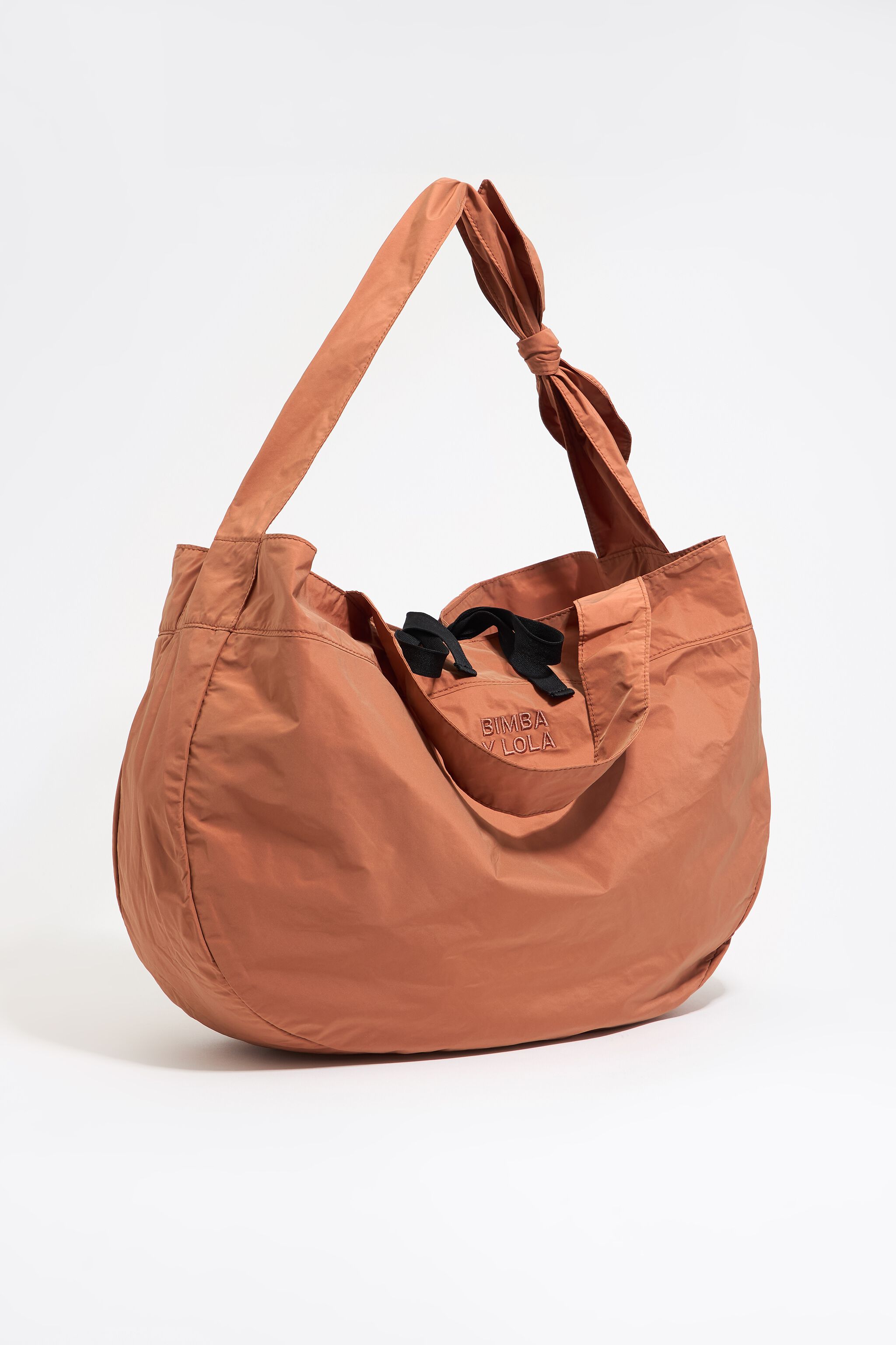 Large orange nylon shopper bag