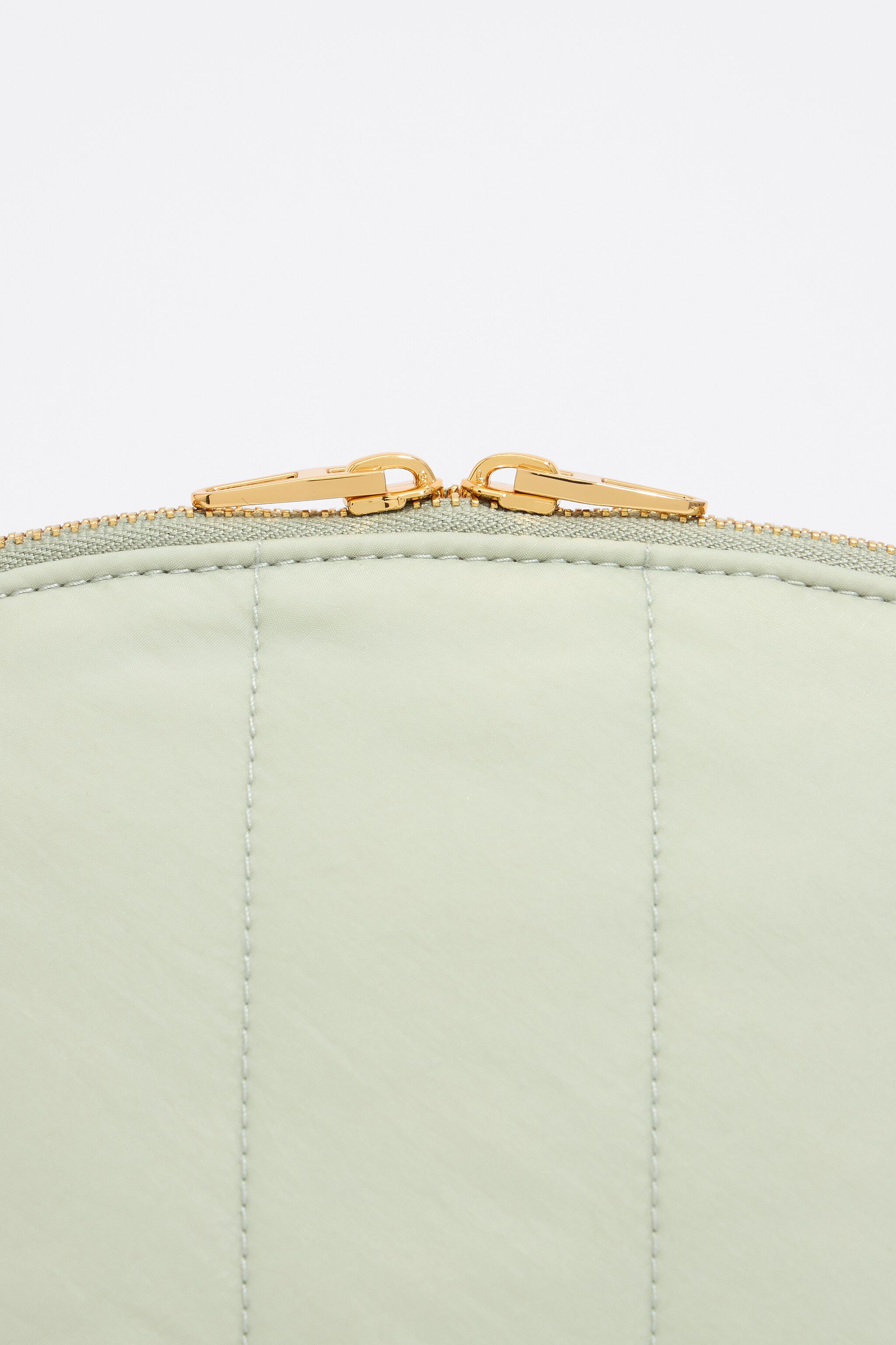 Large aquamarine nylon half-moon make-up case