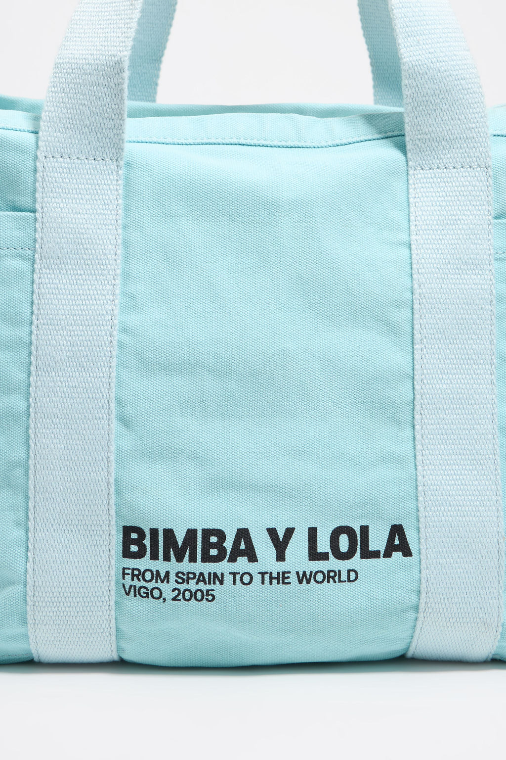 Large light blue woven beach bag