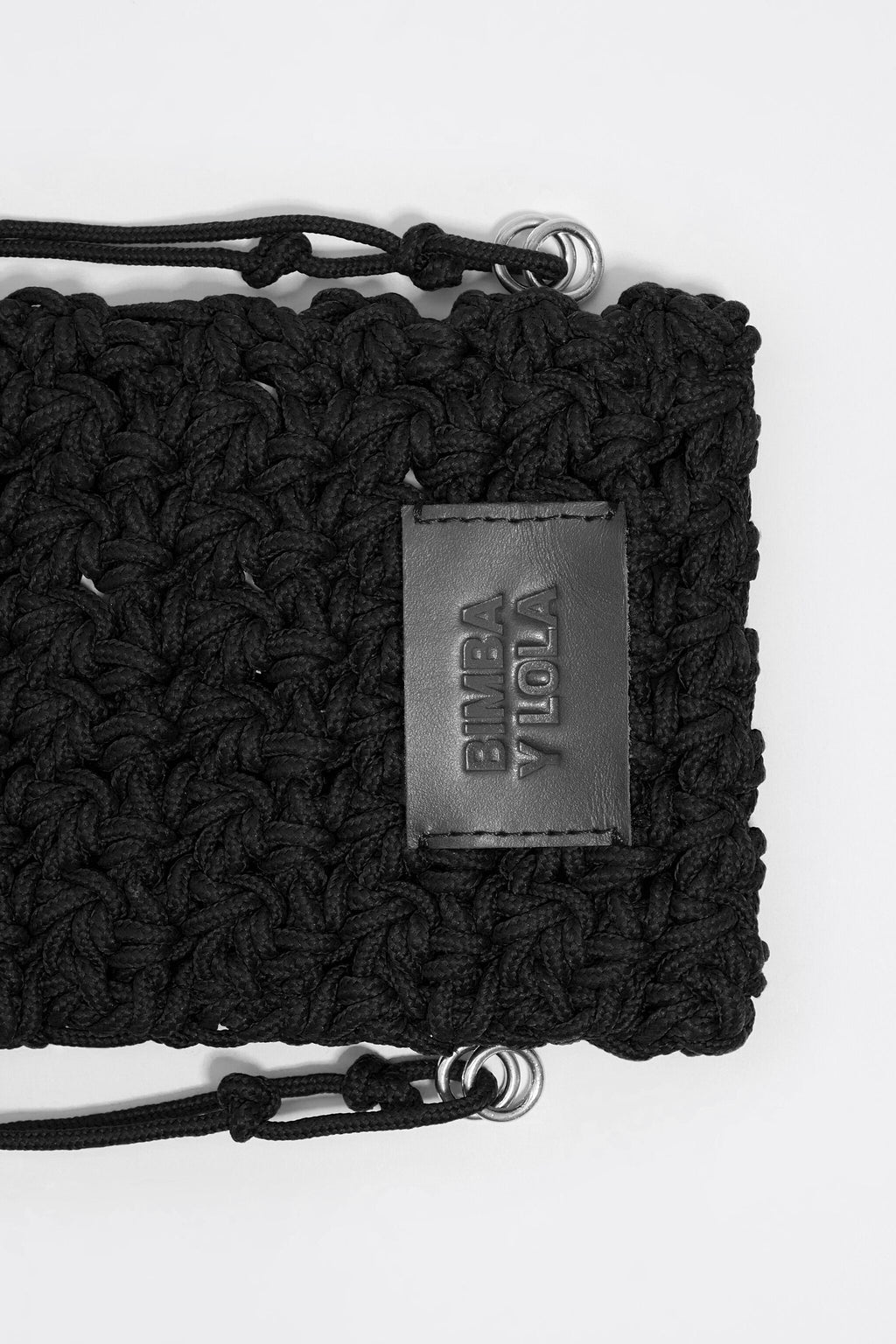 Mini black plaited flat bag