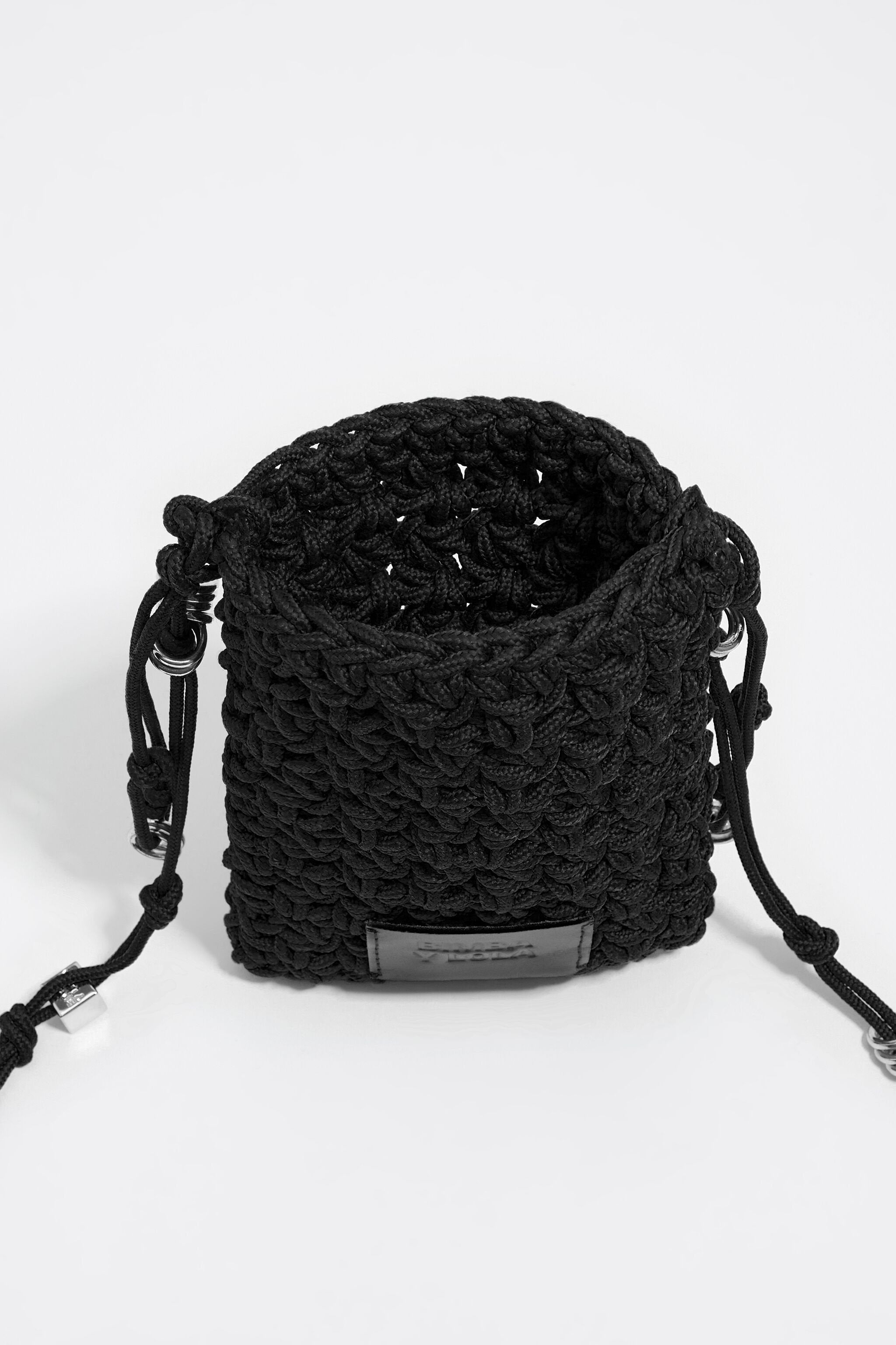 Mini black plaited flat bag