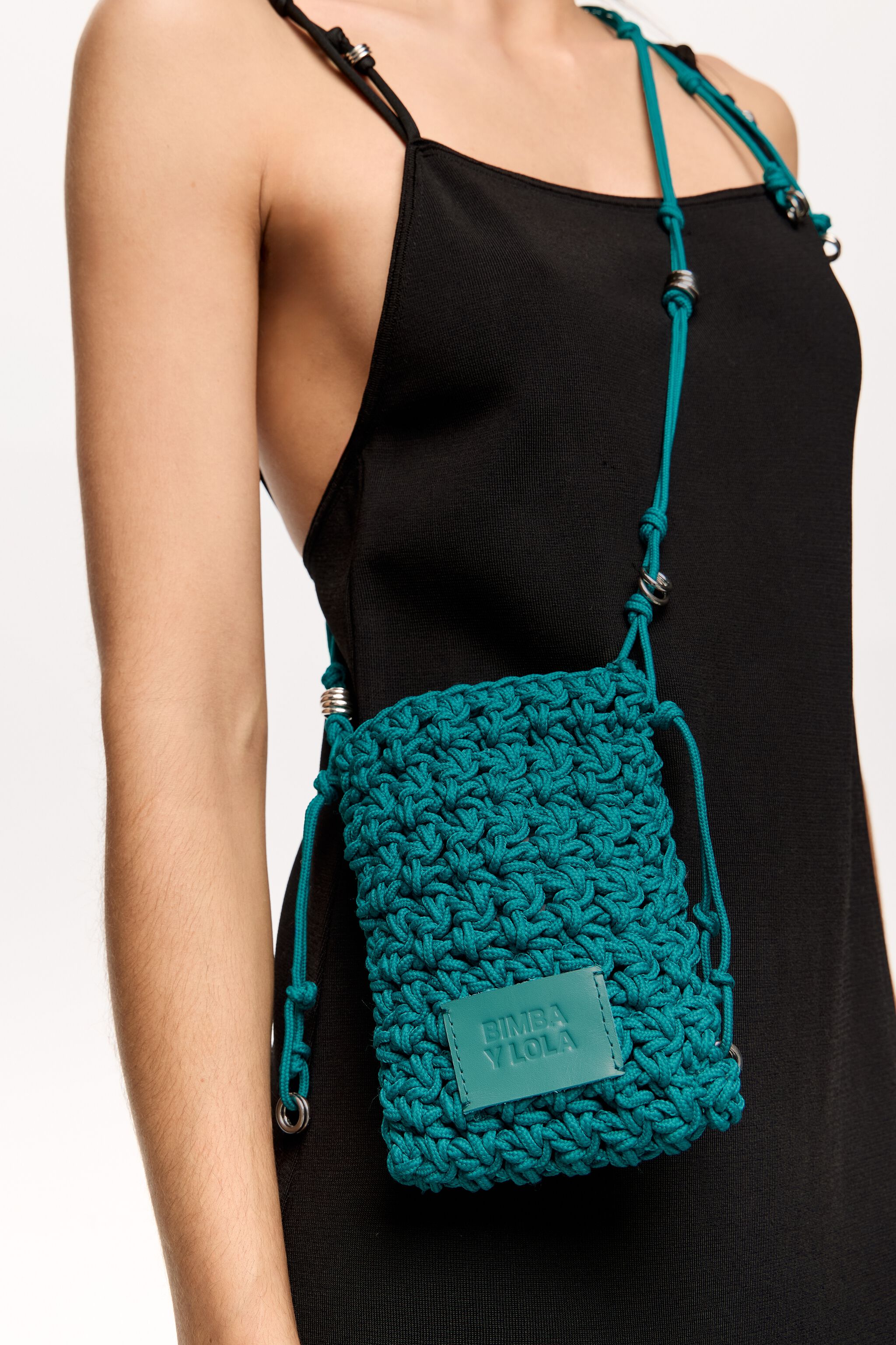 Mini turquoise plaited flat bag