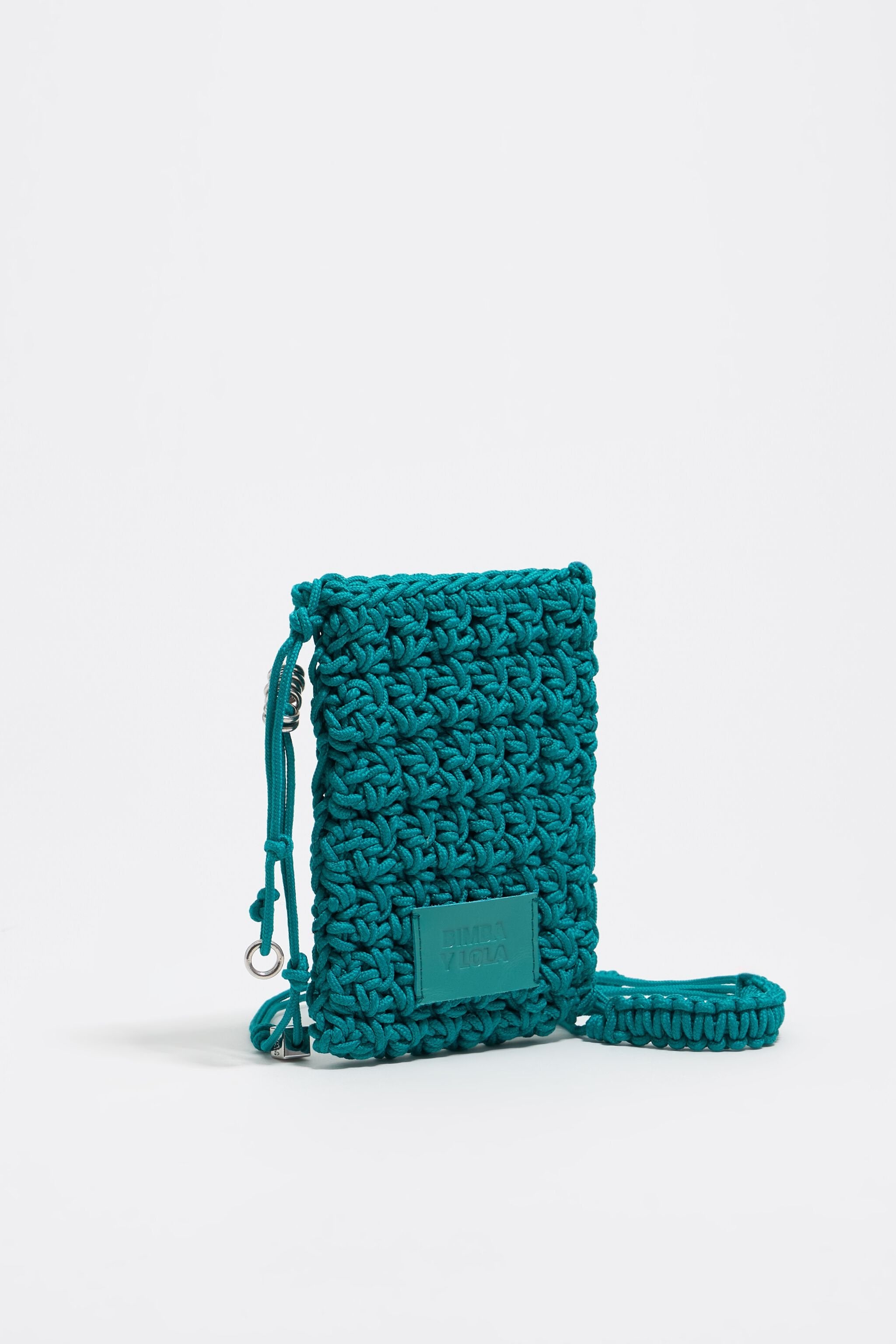 Mini turquoise plaited flat bag