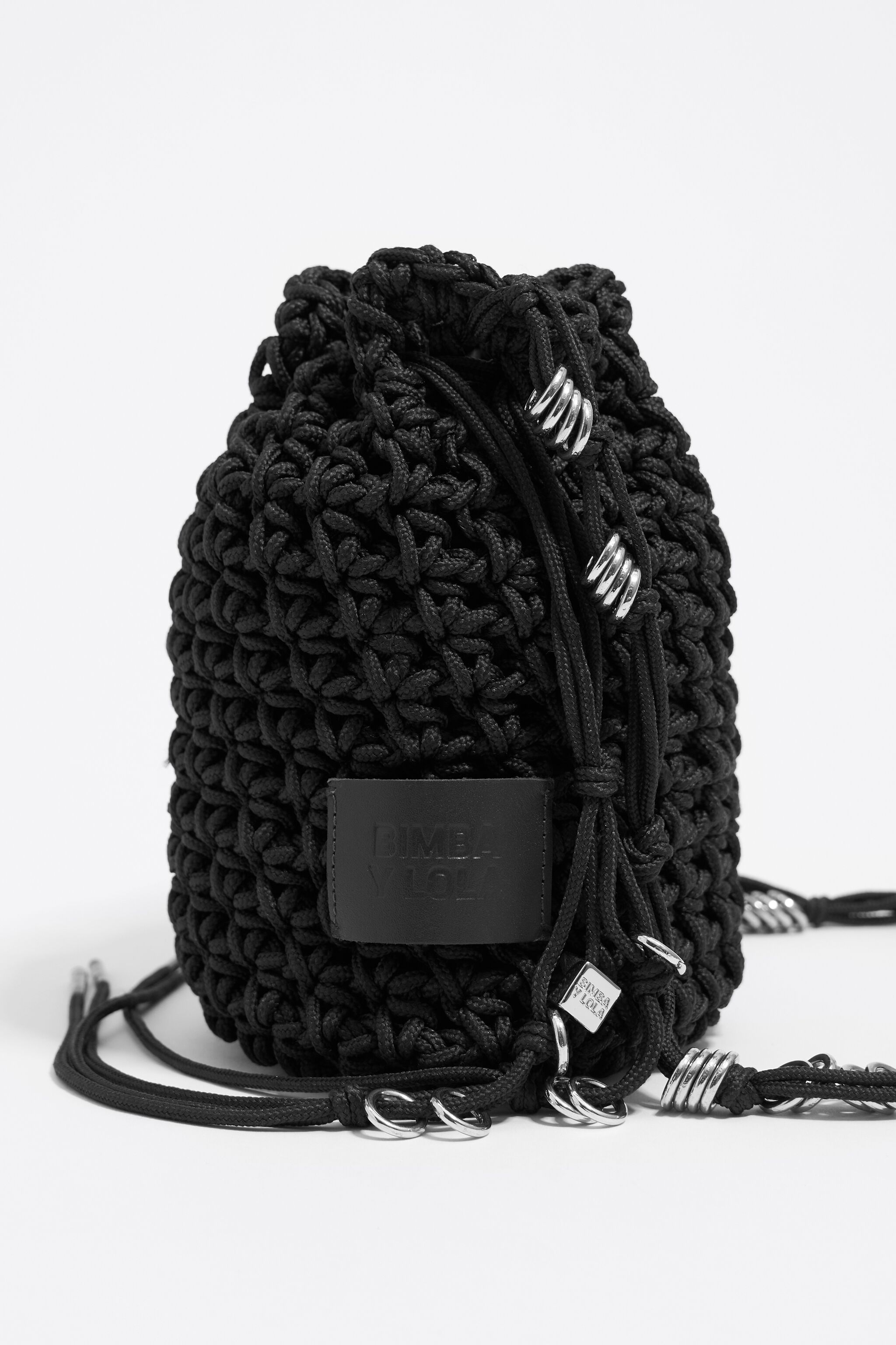 Black plaited shoulder bag