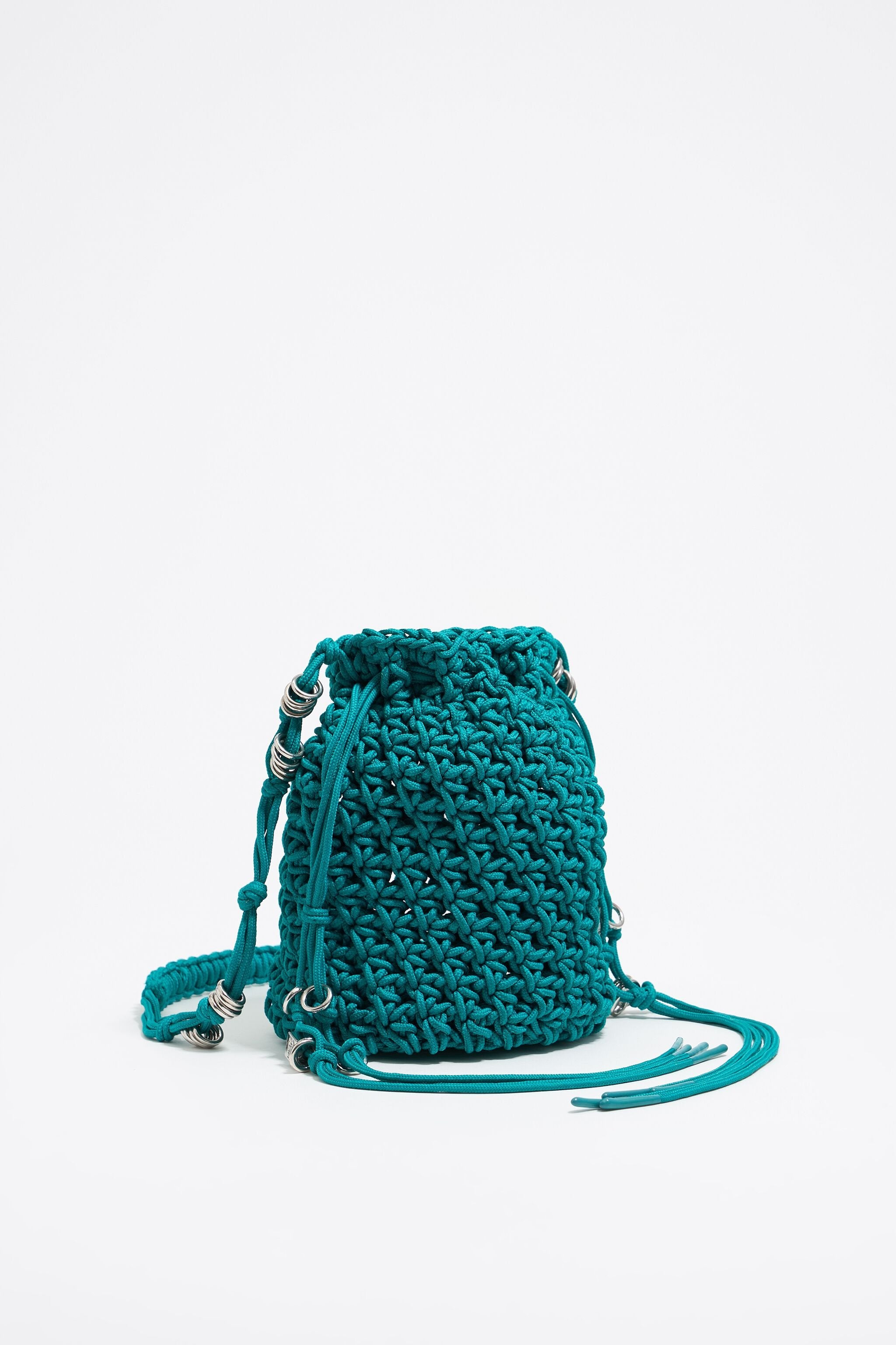 Turquoise plaited shoulder bag