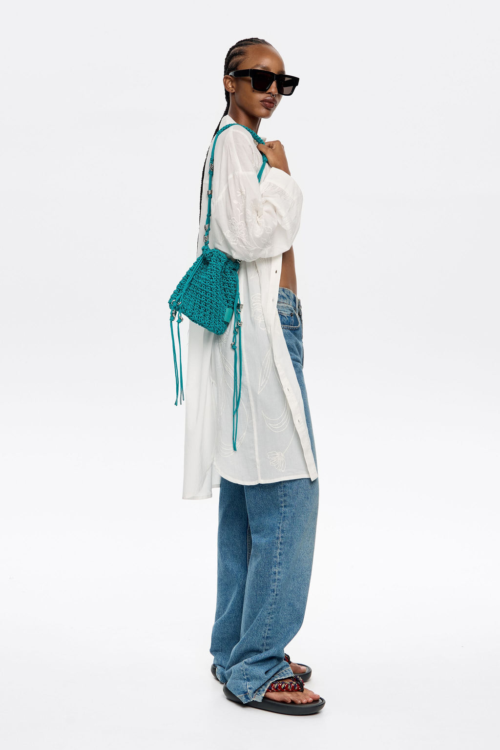 Turquoise plaited shoulder bag