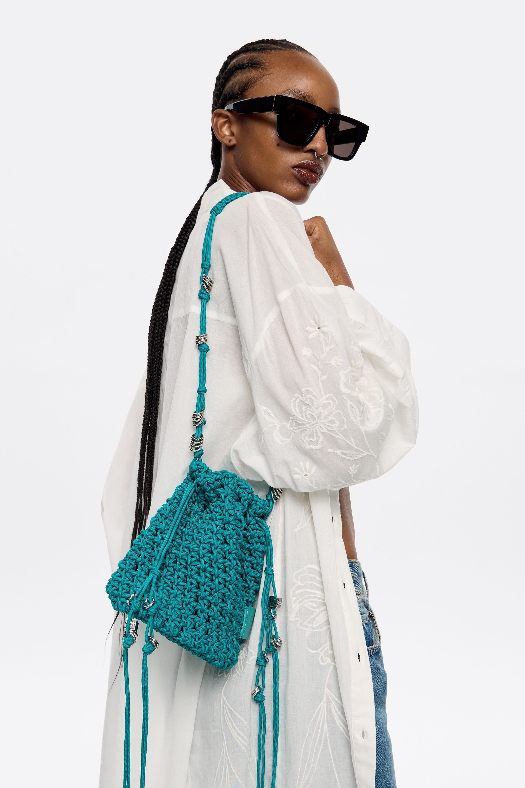 Turquoise plaited shoulder bag