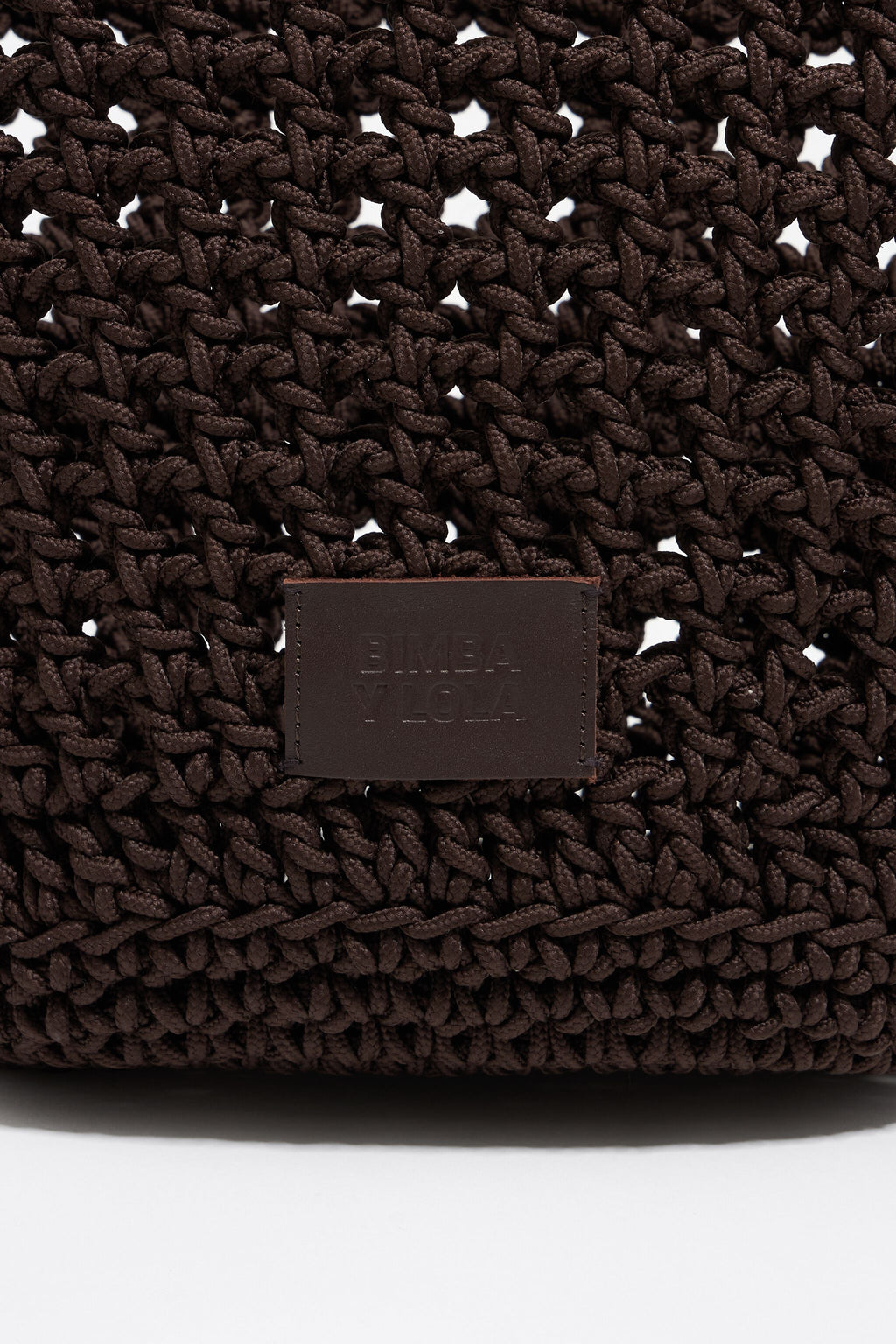 Dark brown plaited leather handbag