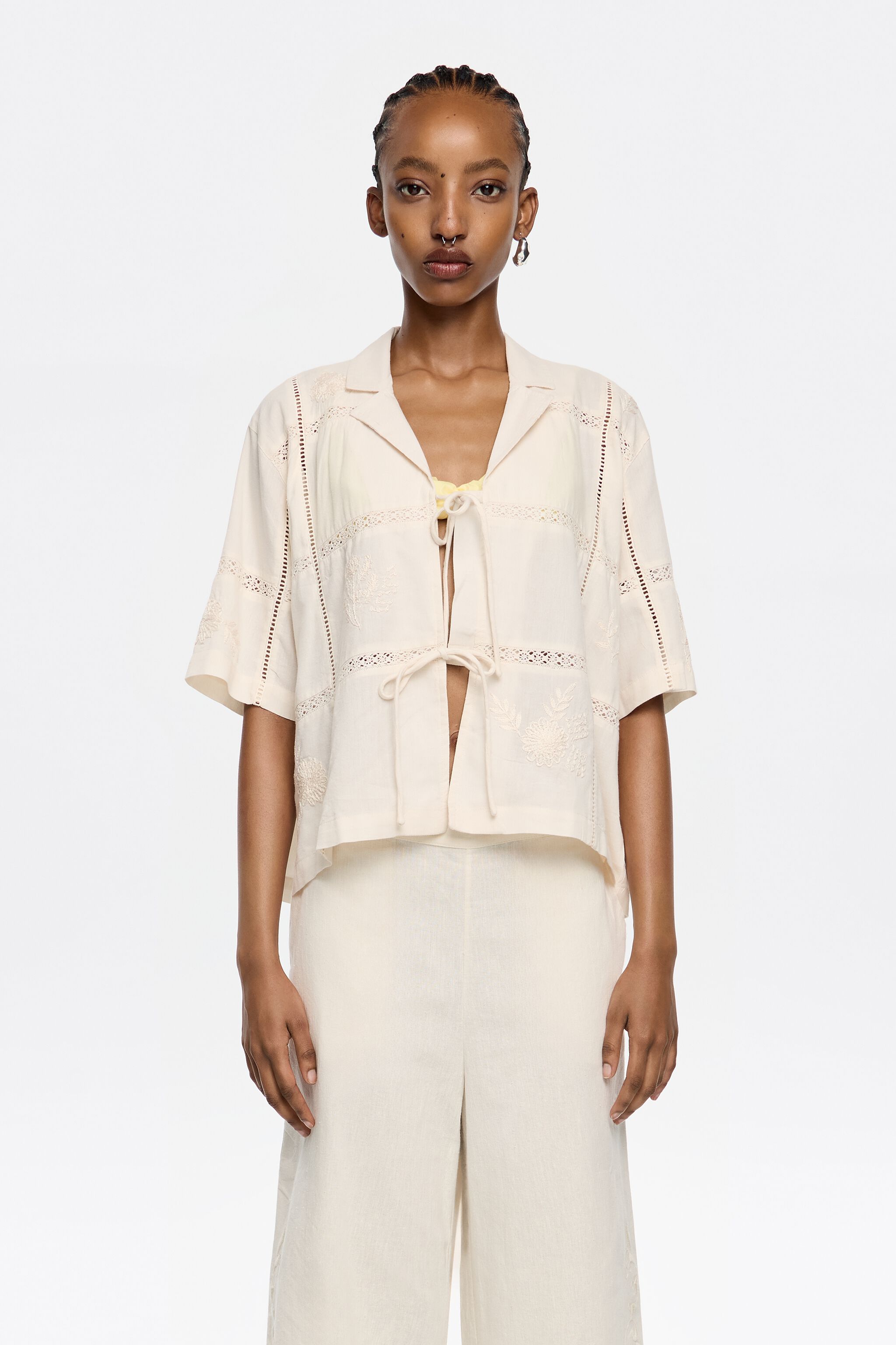 Cream shirt with bows and embroidery