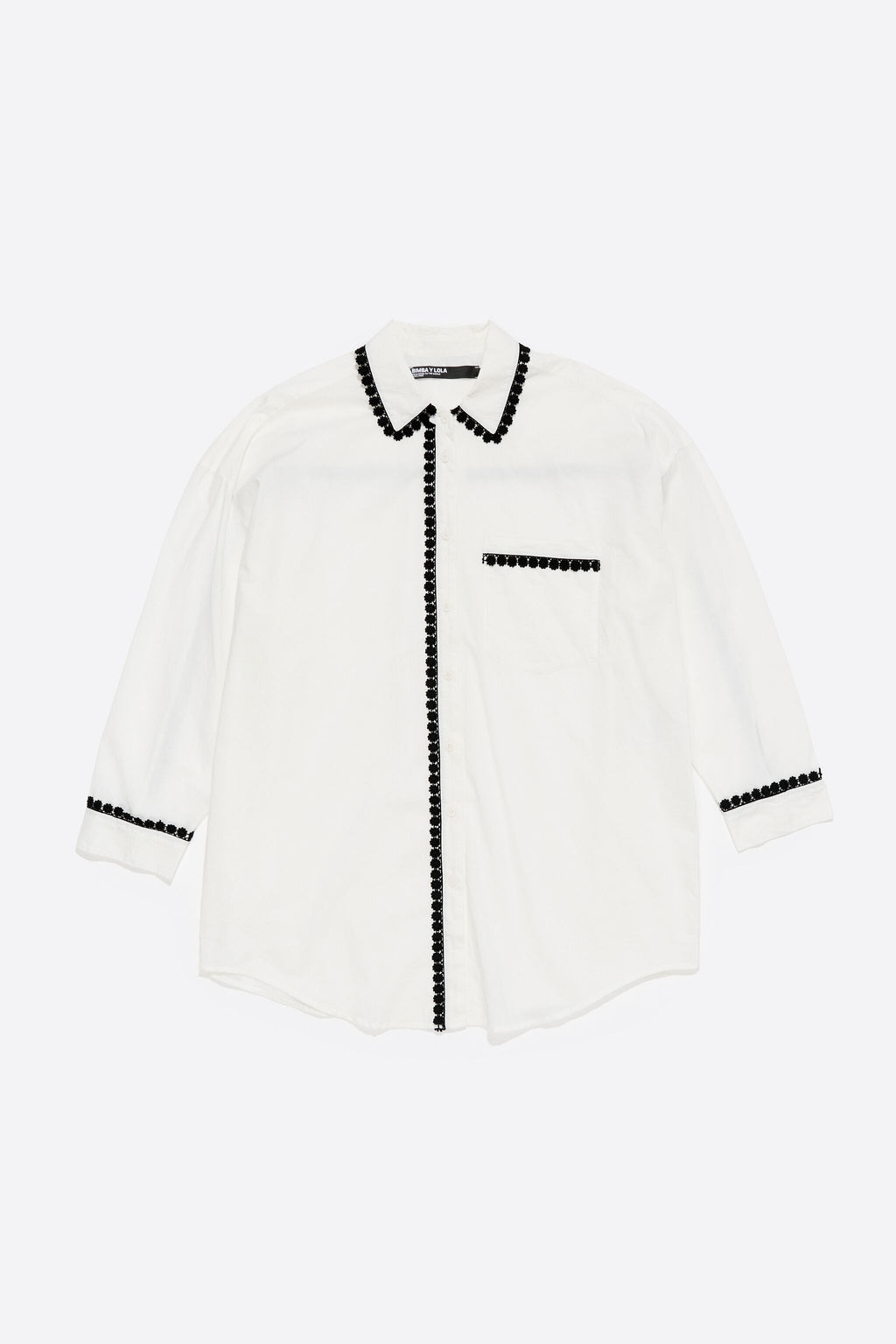 White shirt with raised embroidery