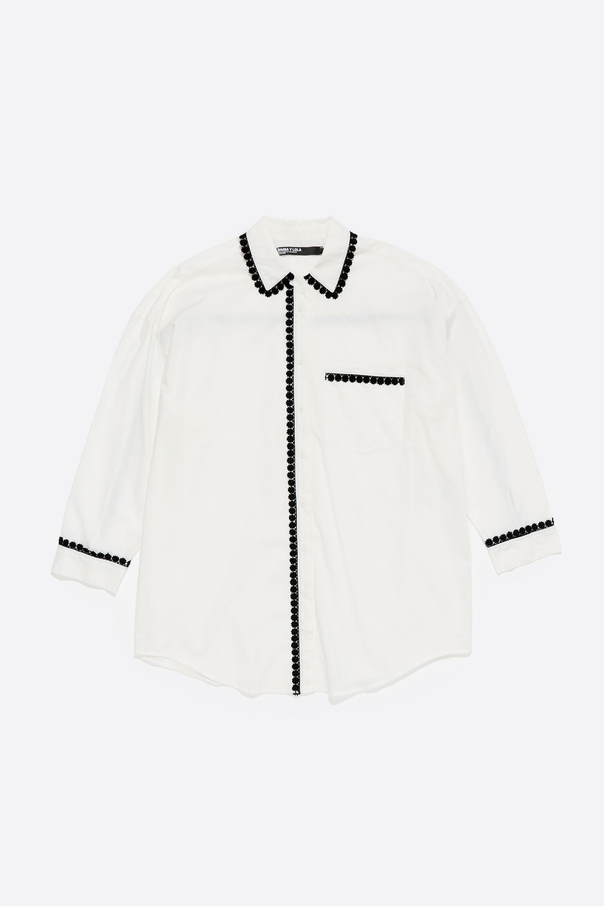 White shirt with raised embroidery