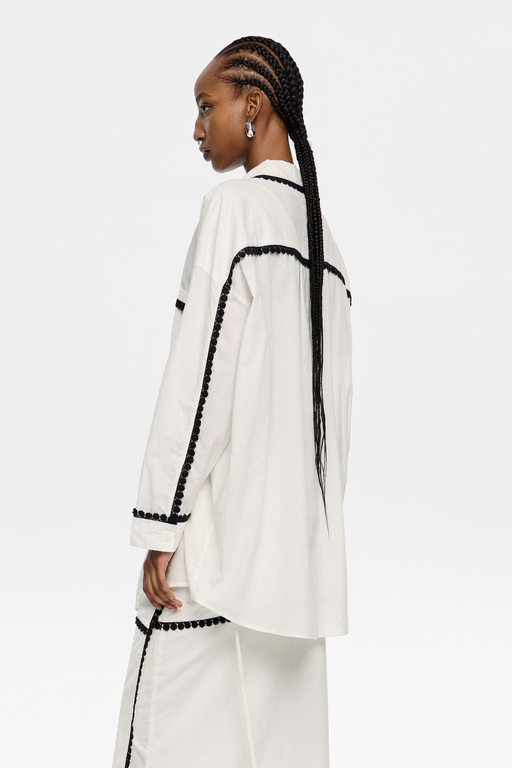 White shirt with raised embroidery