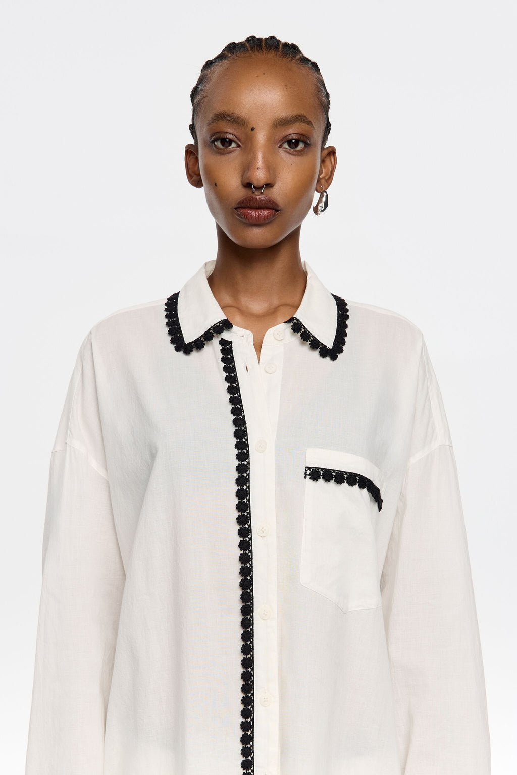 White shirt with raised embroidery
