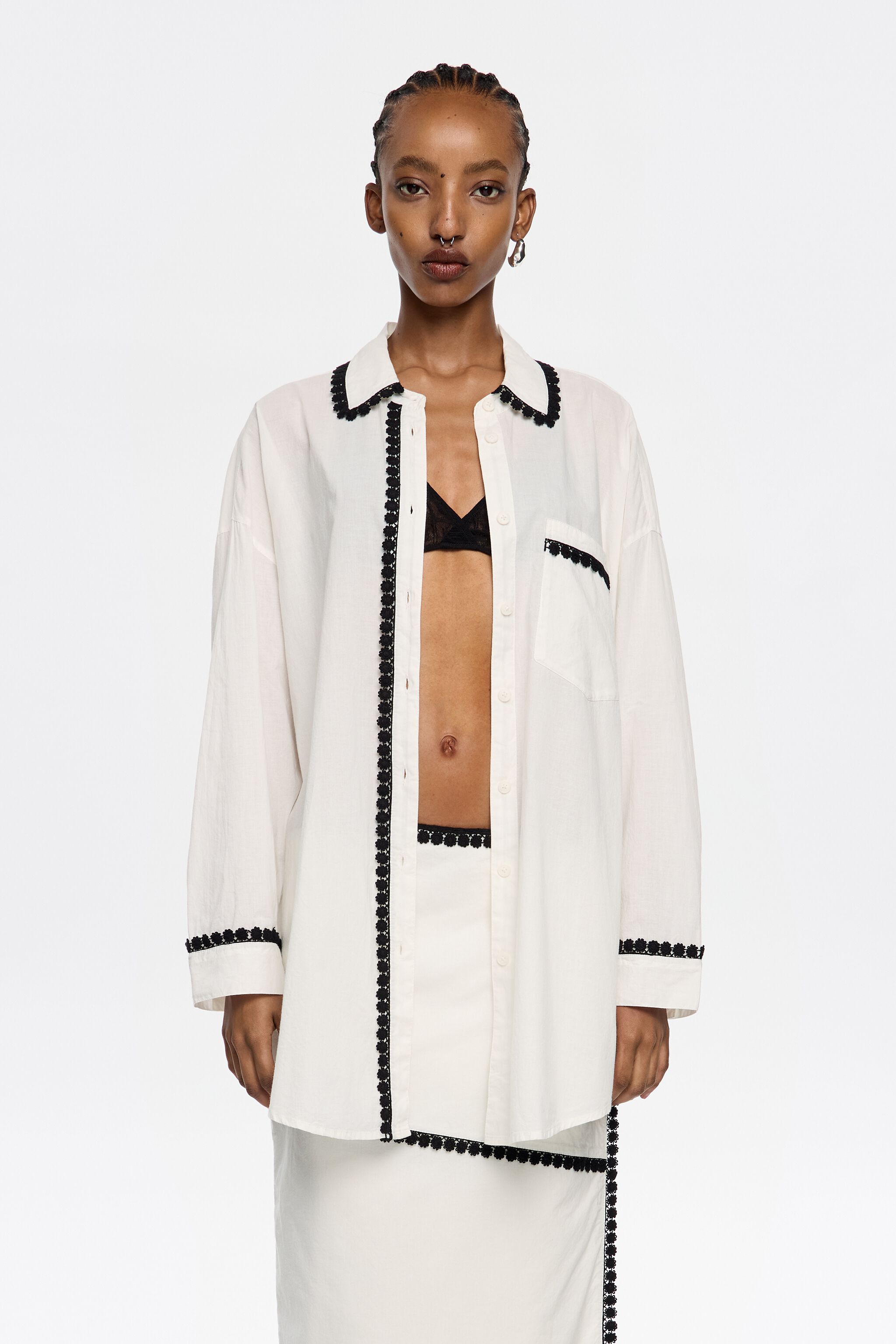 White shirt with raised embroidery