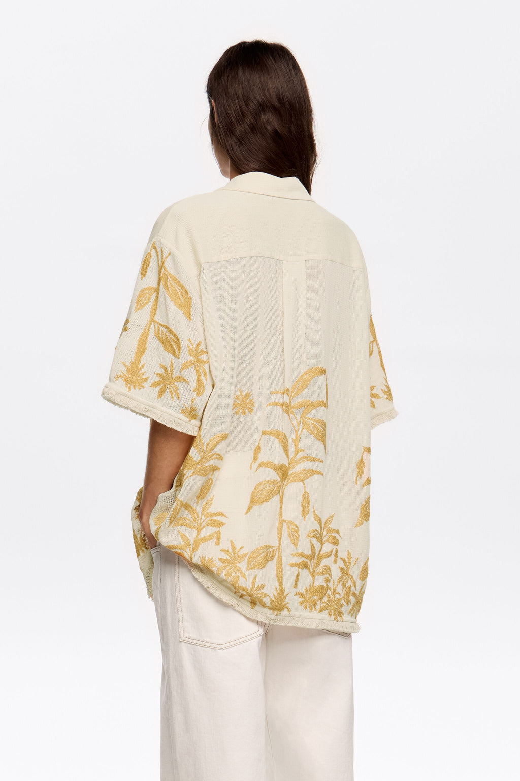 Oversize vanilla shirt with embroidery and frayed details