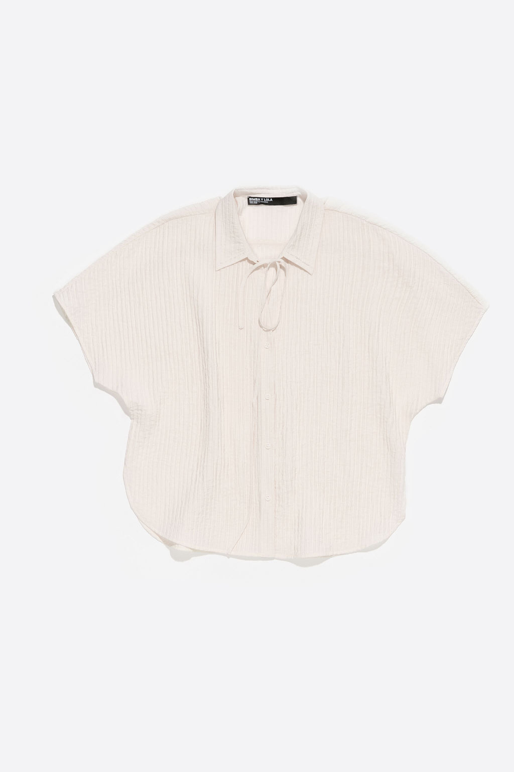 Ivory tie-front cape shirt