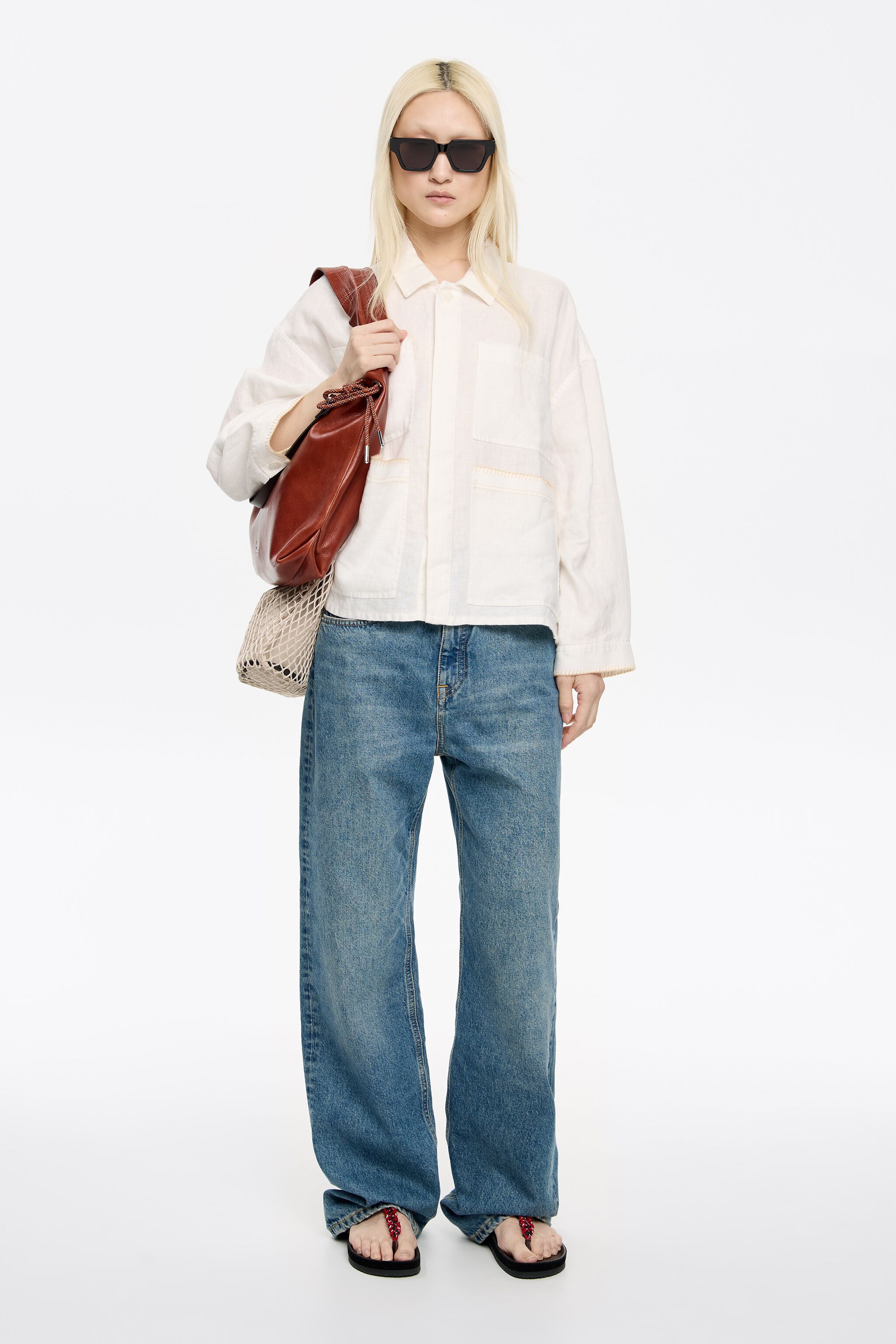 Ivory linen jacket with stitching