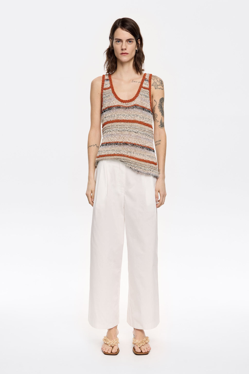 White darted ankle-length trousers