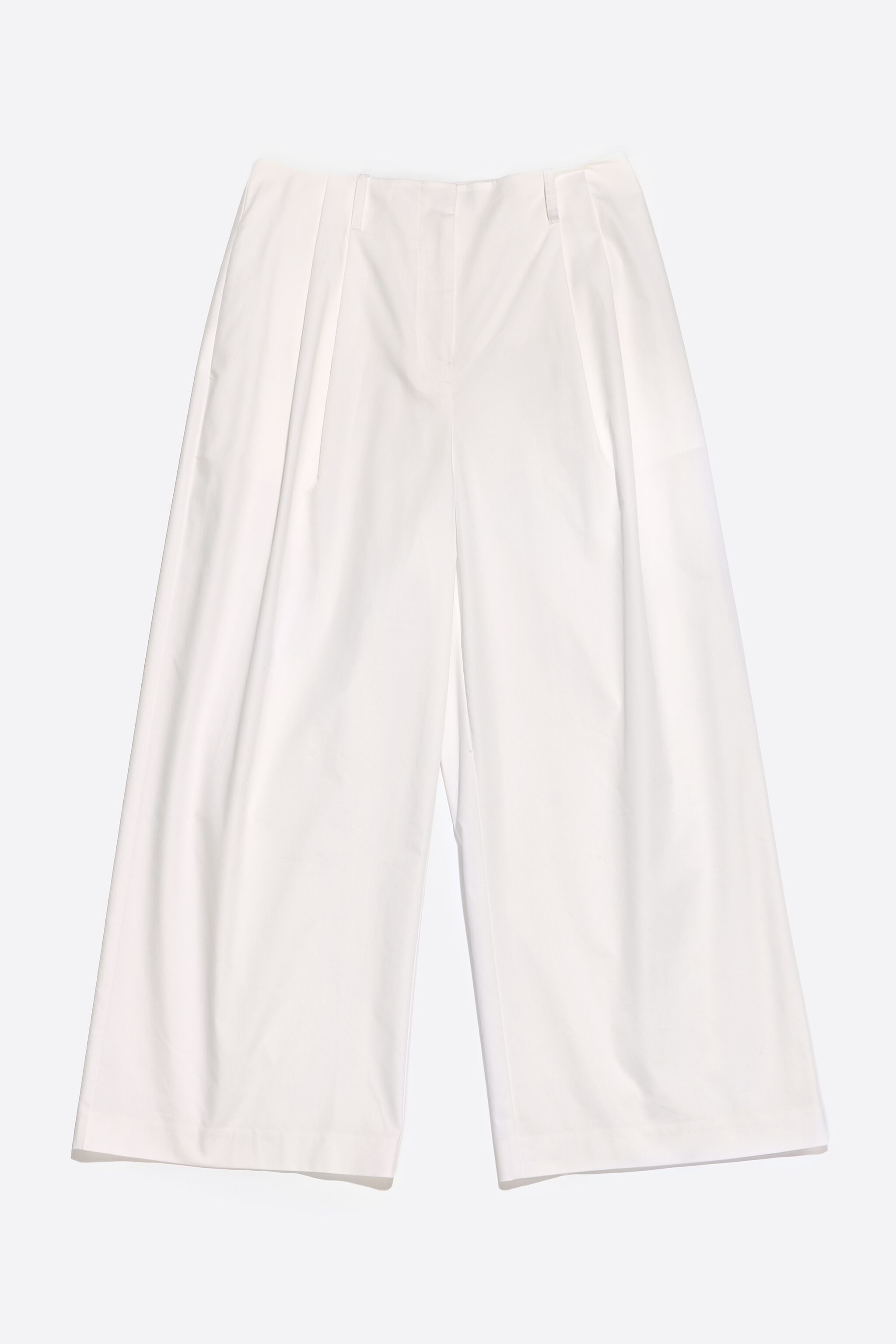 White darted ankle-length trousers