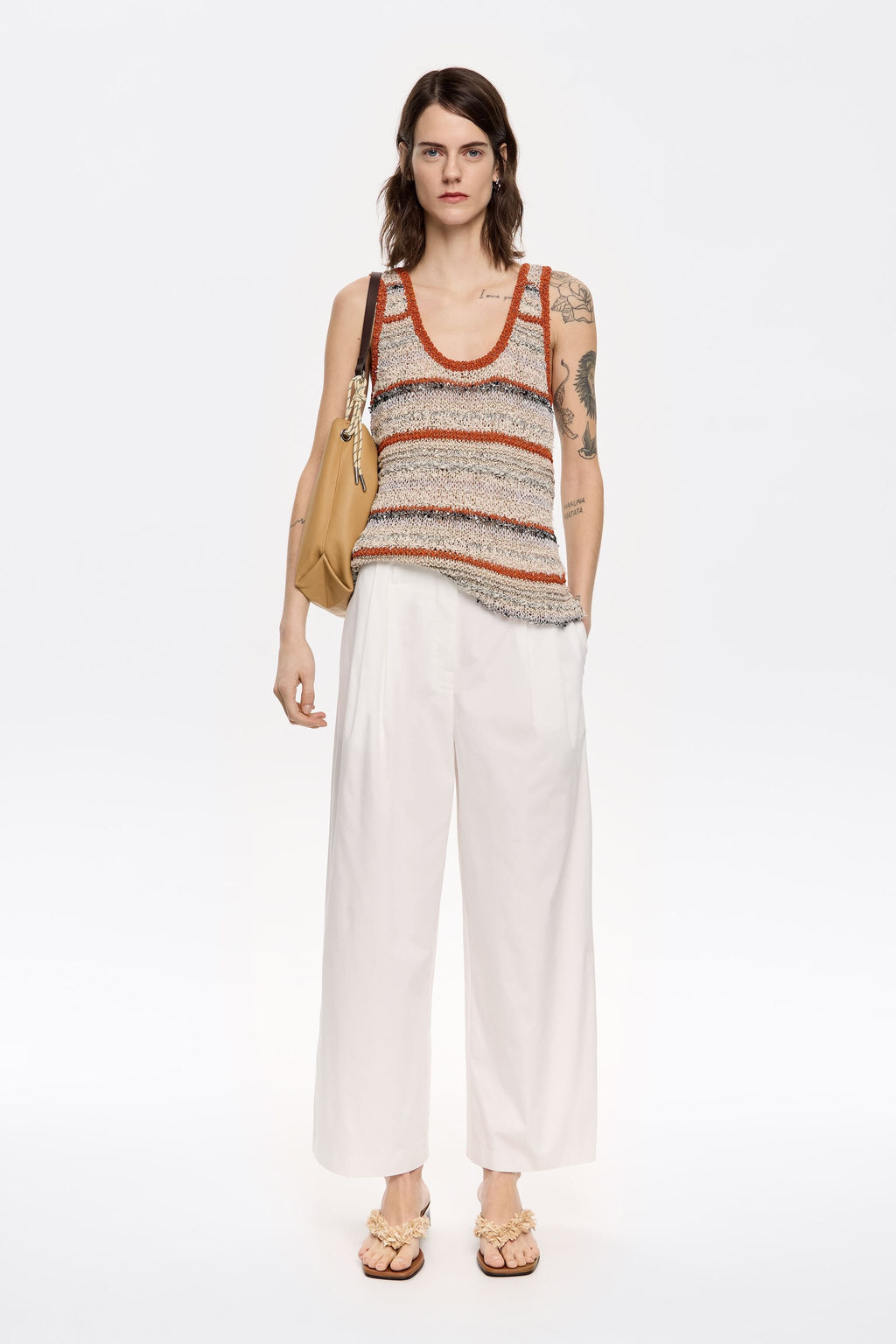White darted ankle-length trousers