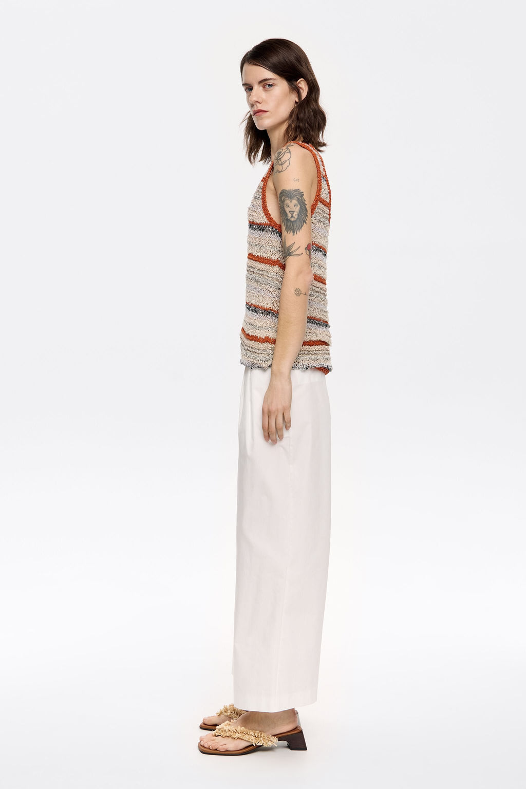White darted ankle-length trousers