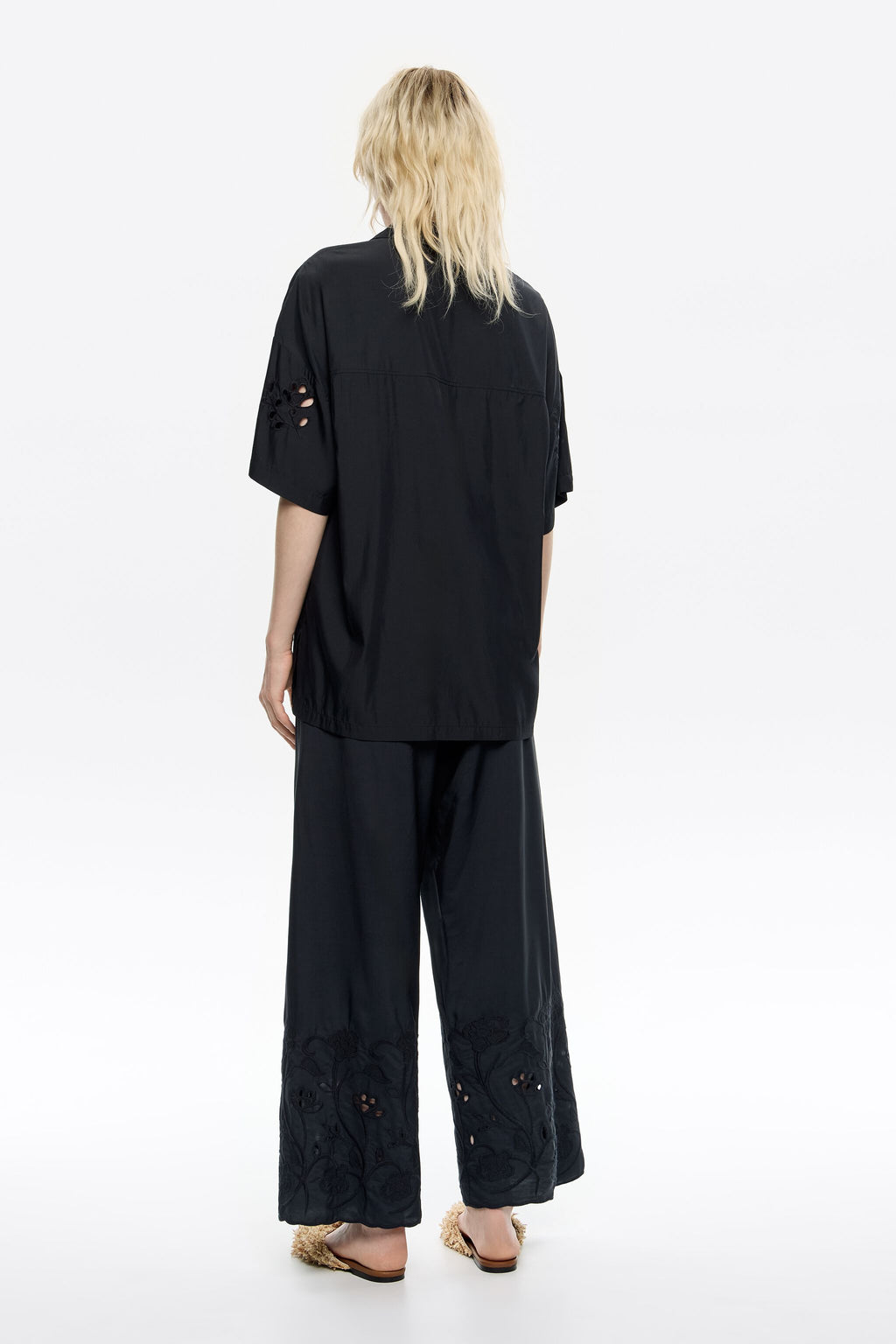 Straight black trousers with embroidery
