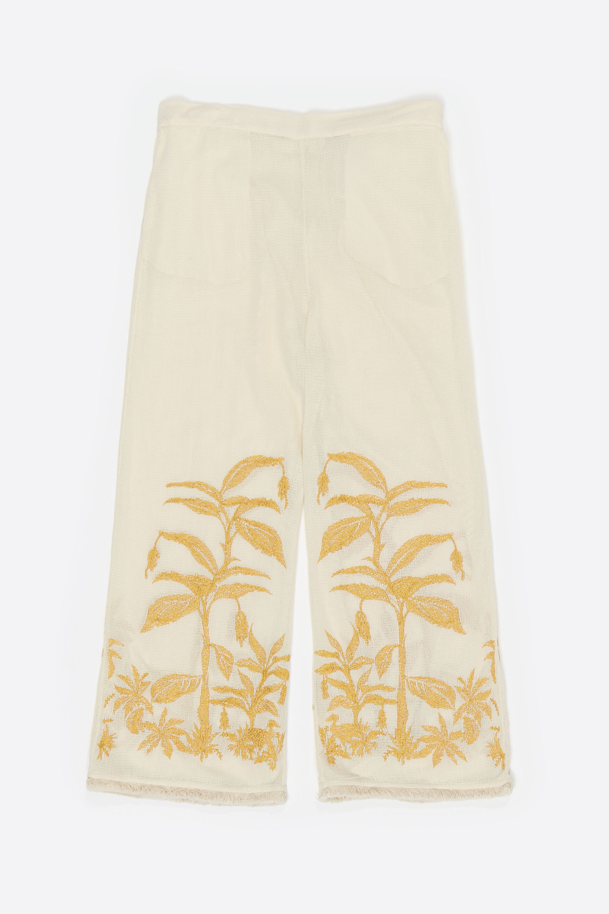 Straight vanilla trousers with embroidery and frayed details