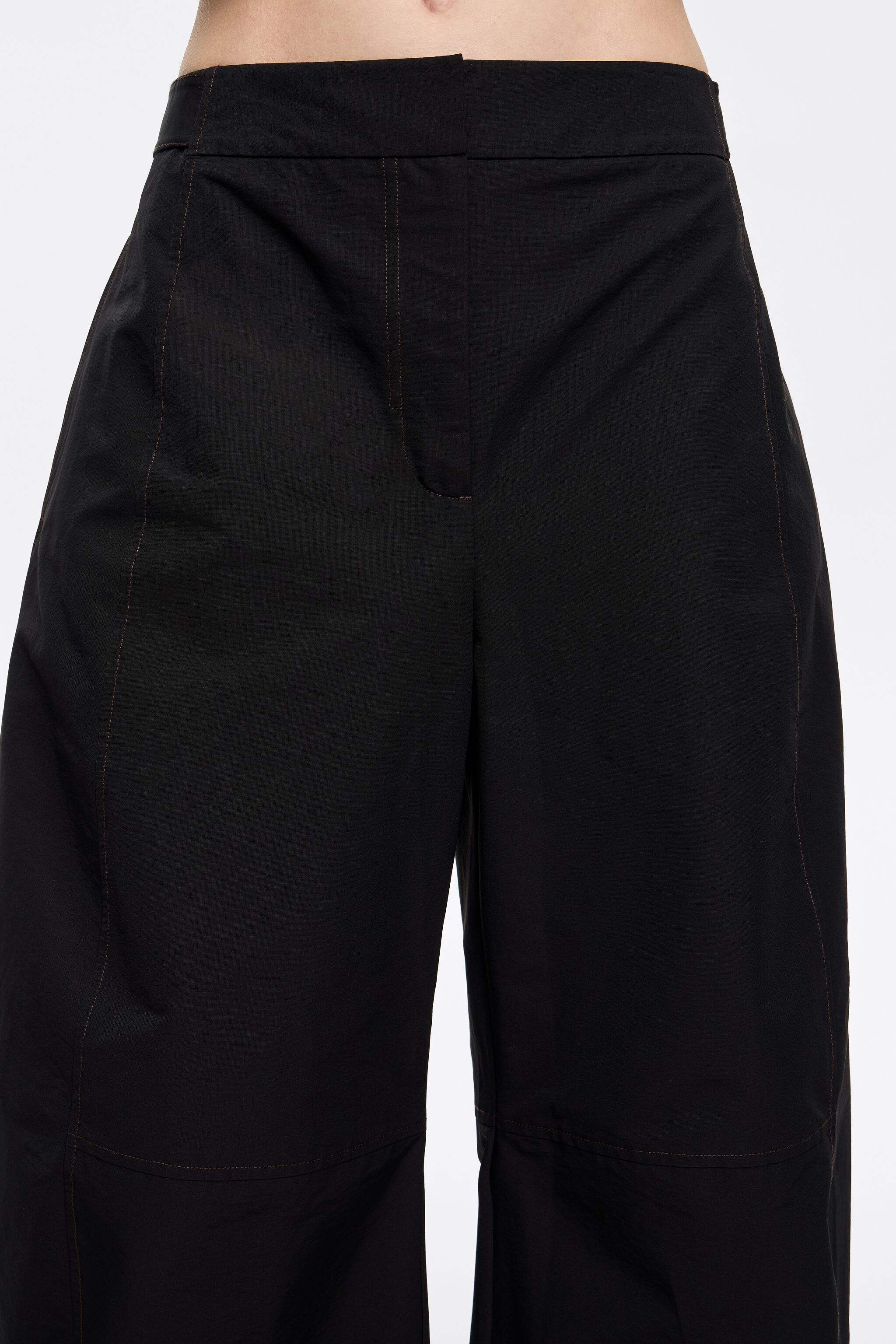 Black technical fabric barrel leg trousers
